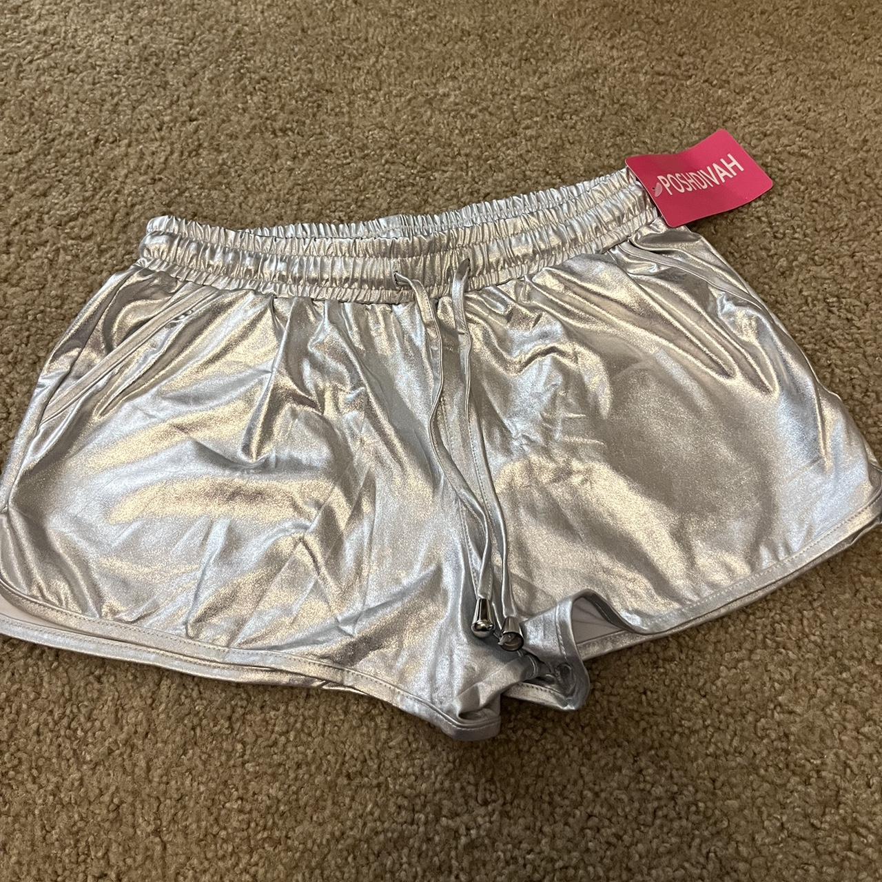 silver shiny booty shorts. never worn but they are... - Depop