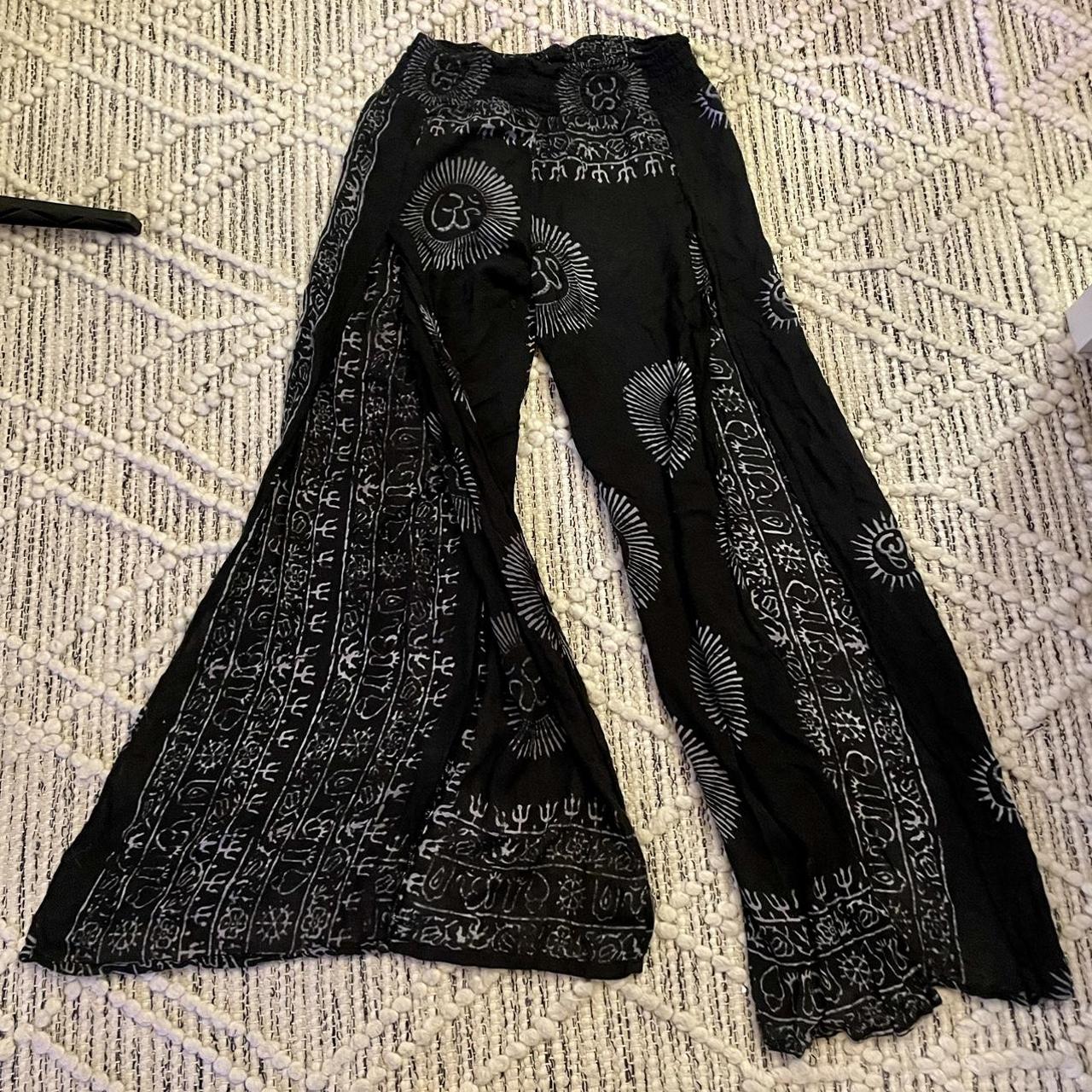 Super light weight slit pants! A bit of wear around... - Depop