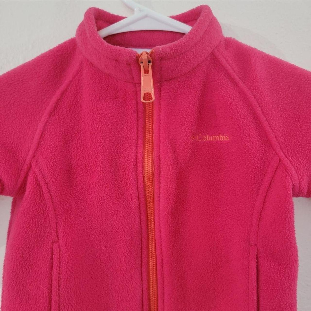 A Columbia pink fleece jacket with an orange zipper... Depop