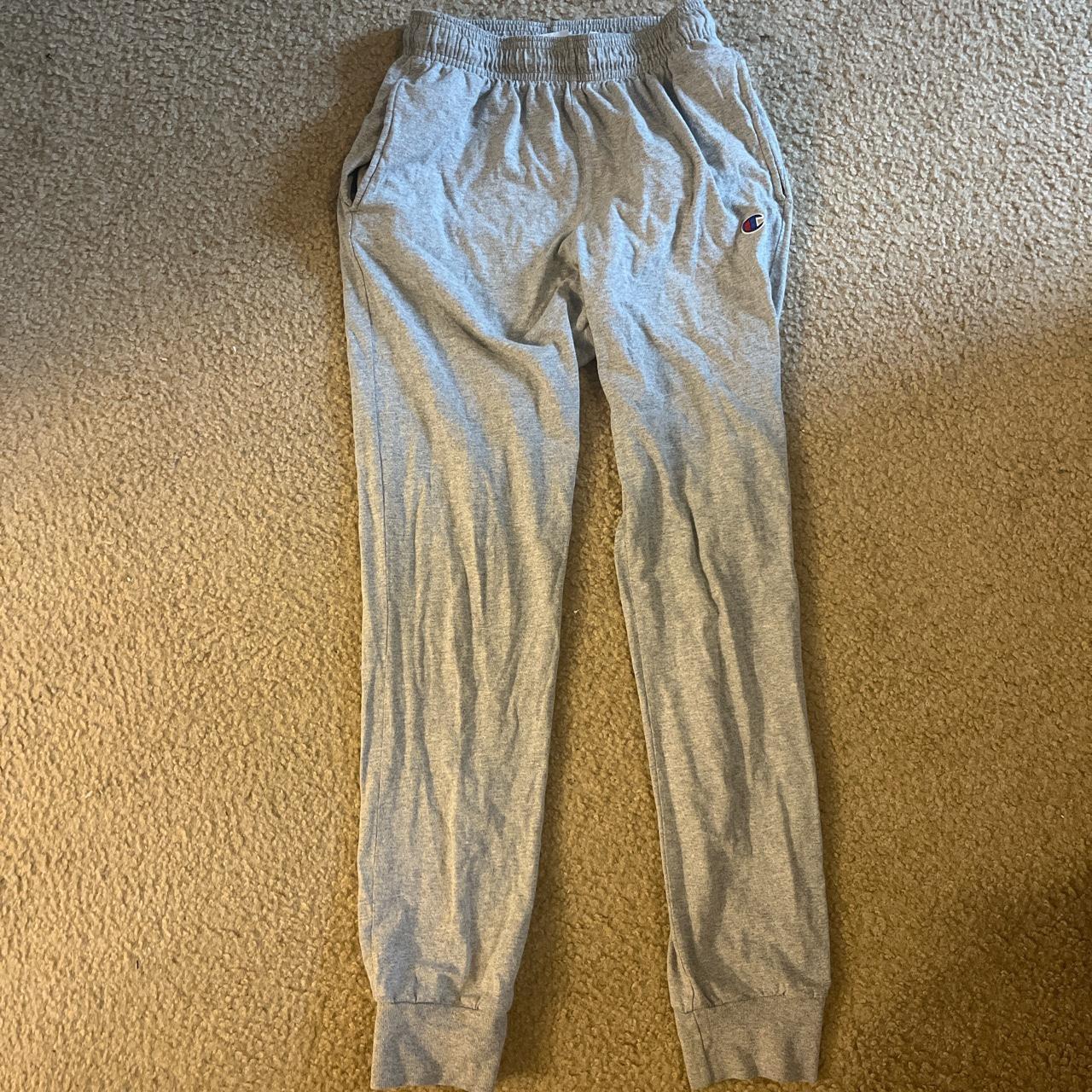 Grey cuffed champion lightweight sweatpants size... - Depop