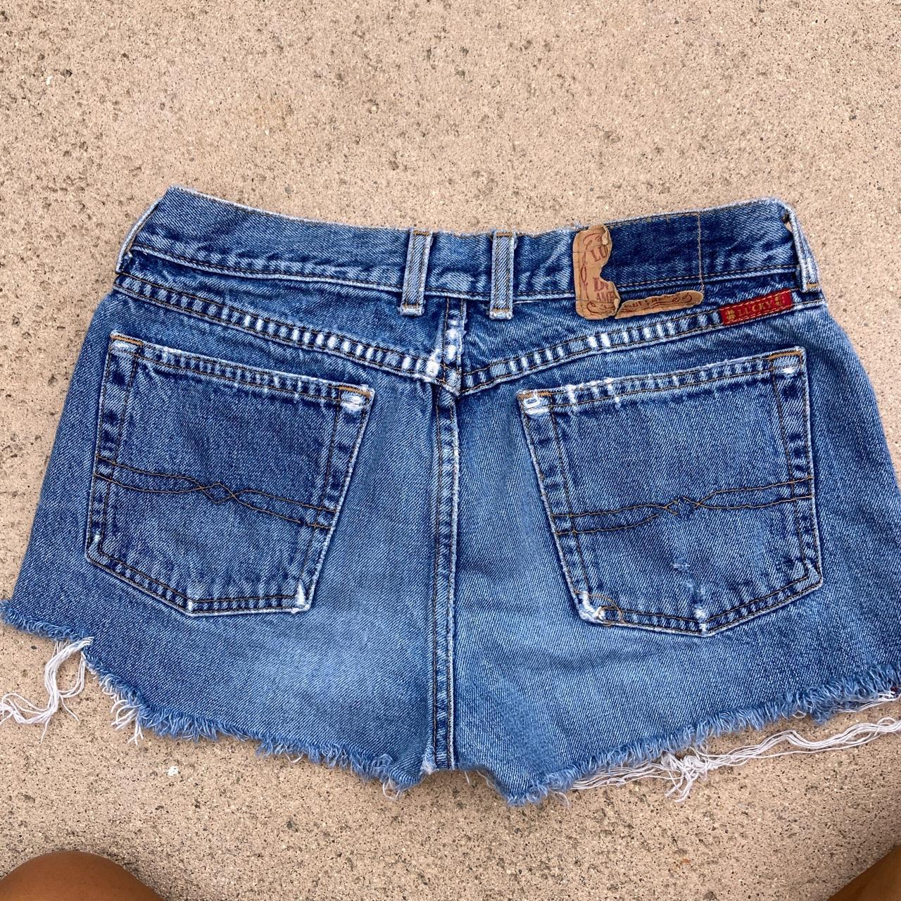 Distressed daisy dukes cut off shorts lucky brand... - Depop