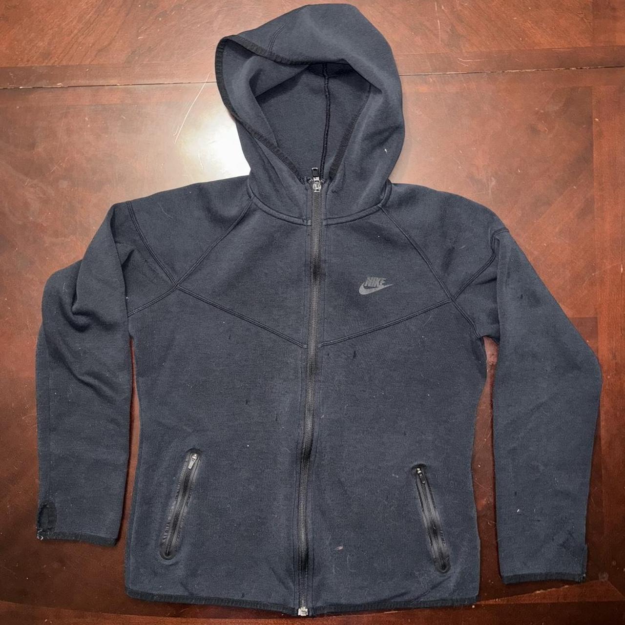 A Nike Zip Up with a Few Imperfections Such as the... - Depop