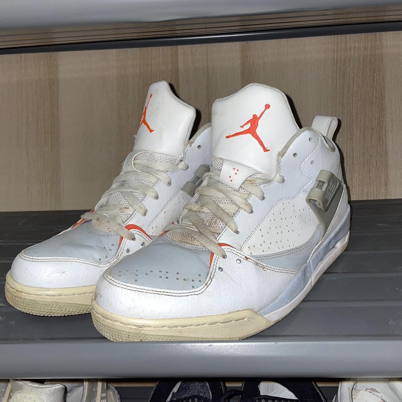 red and white jordan fours