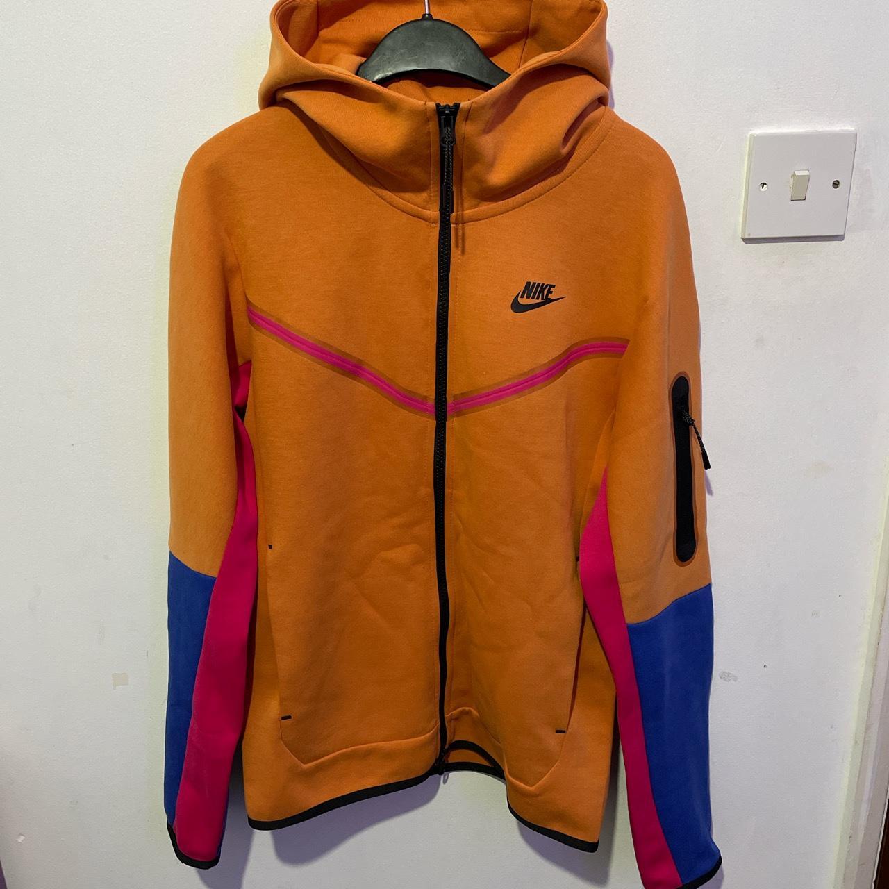 pink and blue nike tech fleece