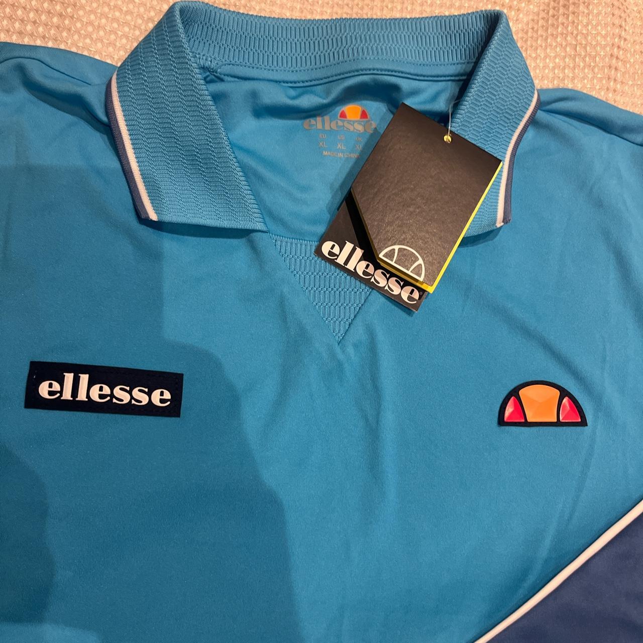 Ellesse Collared Dri-Fit Tennis Shirt in Blue... - Depop