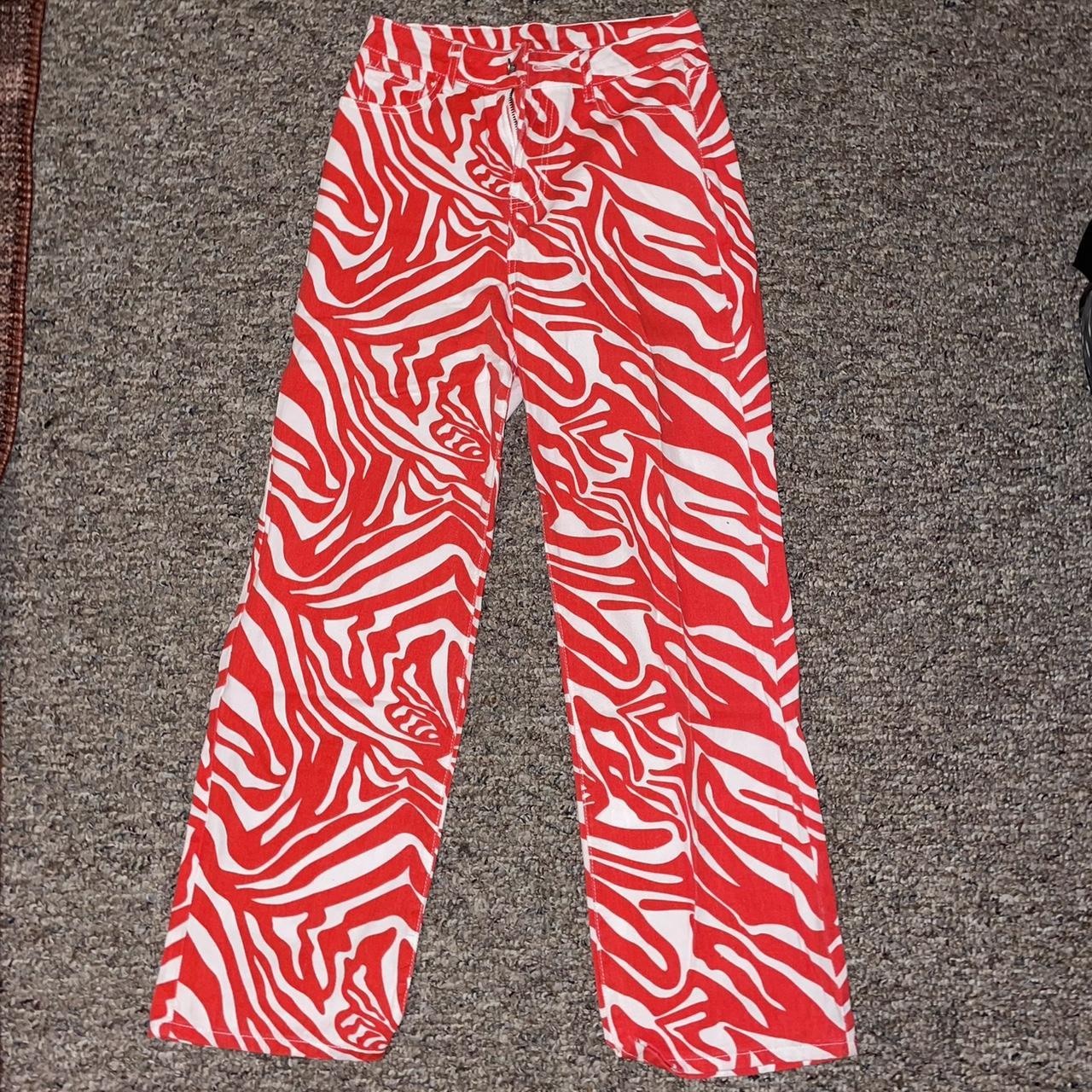 Red and white zebra jeans! Super cute for gamedays... Depop