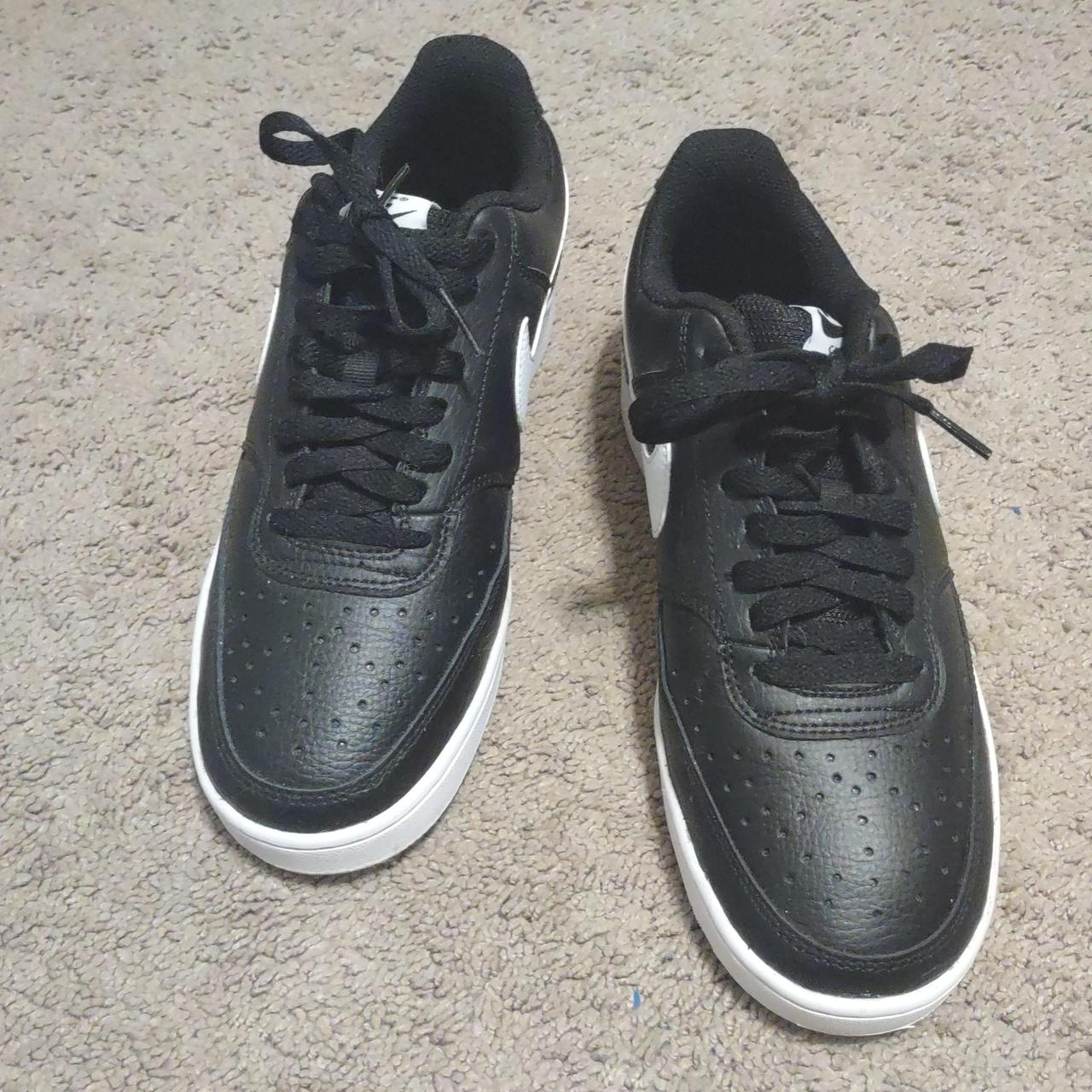 half white half black nike shoes