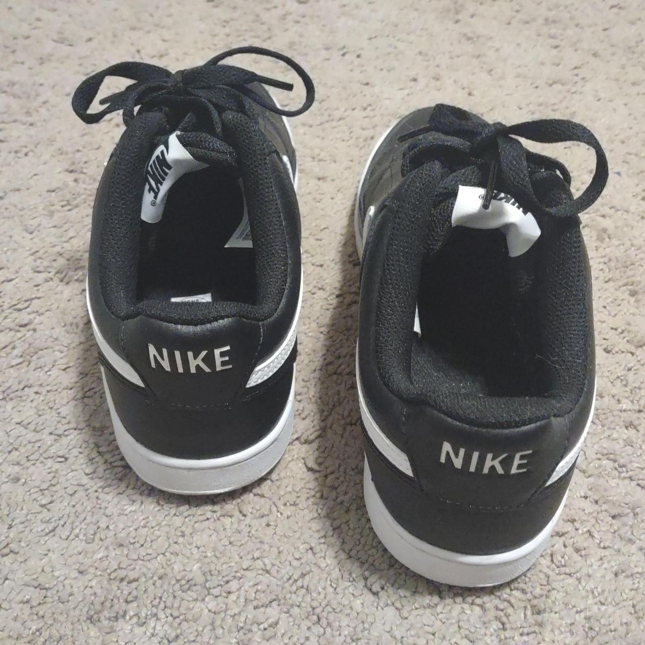 half white half black nike shoes