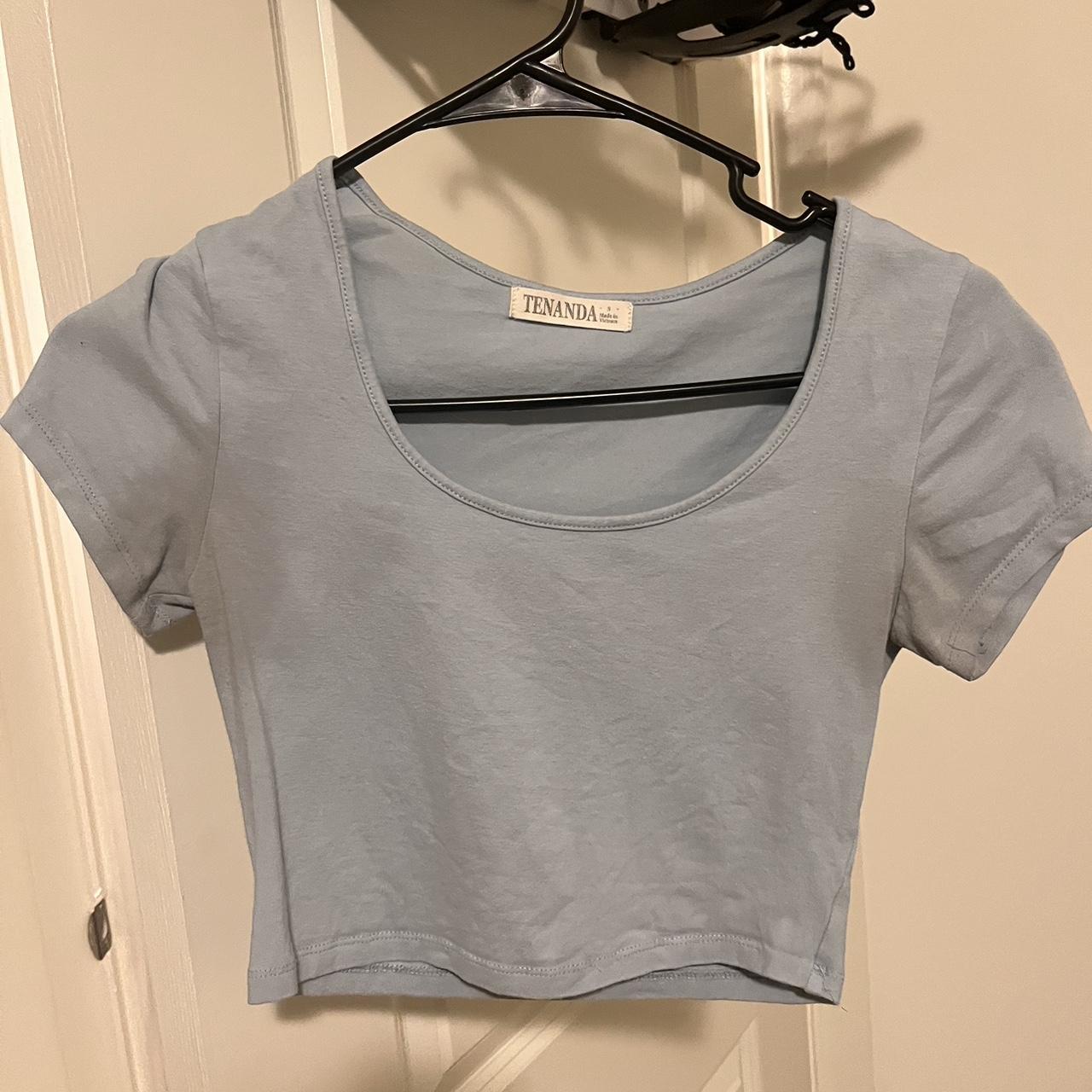 Amazon blue crop top. Has some darkening near the... - Depop