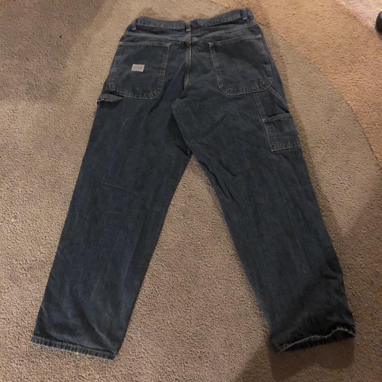 Baggy dark grey vintage wranglers. There is a whole... - Depop