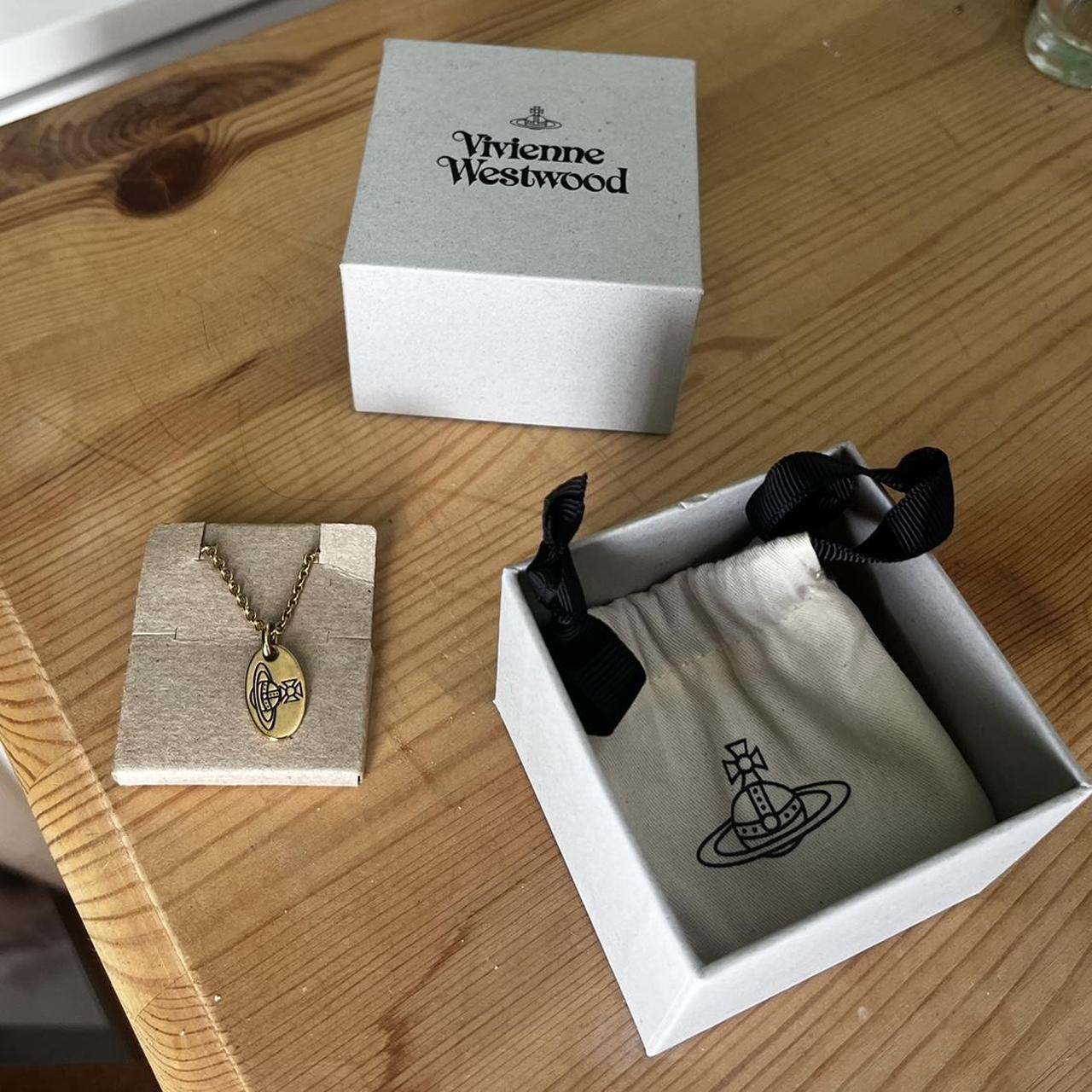 Gold Vivienne Westwood pendant necklace💛in very good... - Depop