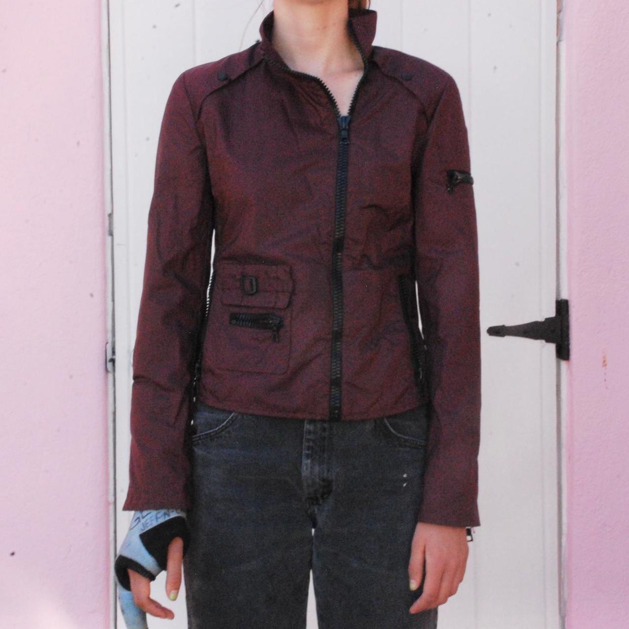 MIU MIU BURGUNDY ASYMMETRICAL ZIPPER JACKET, retails...