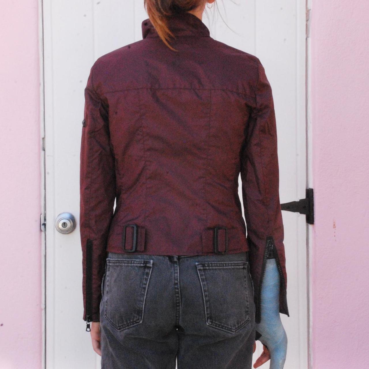 MIU MIU BURGUNDY ASYMMETRICAL ZIPPER JACKET, retails...