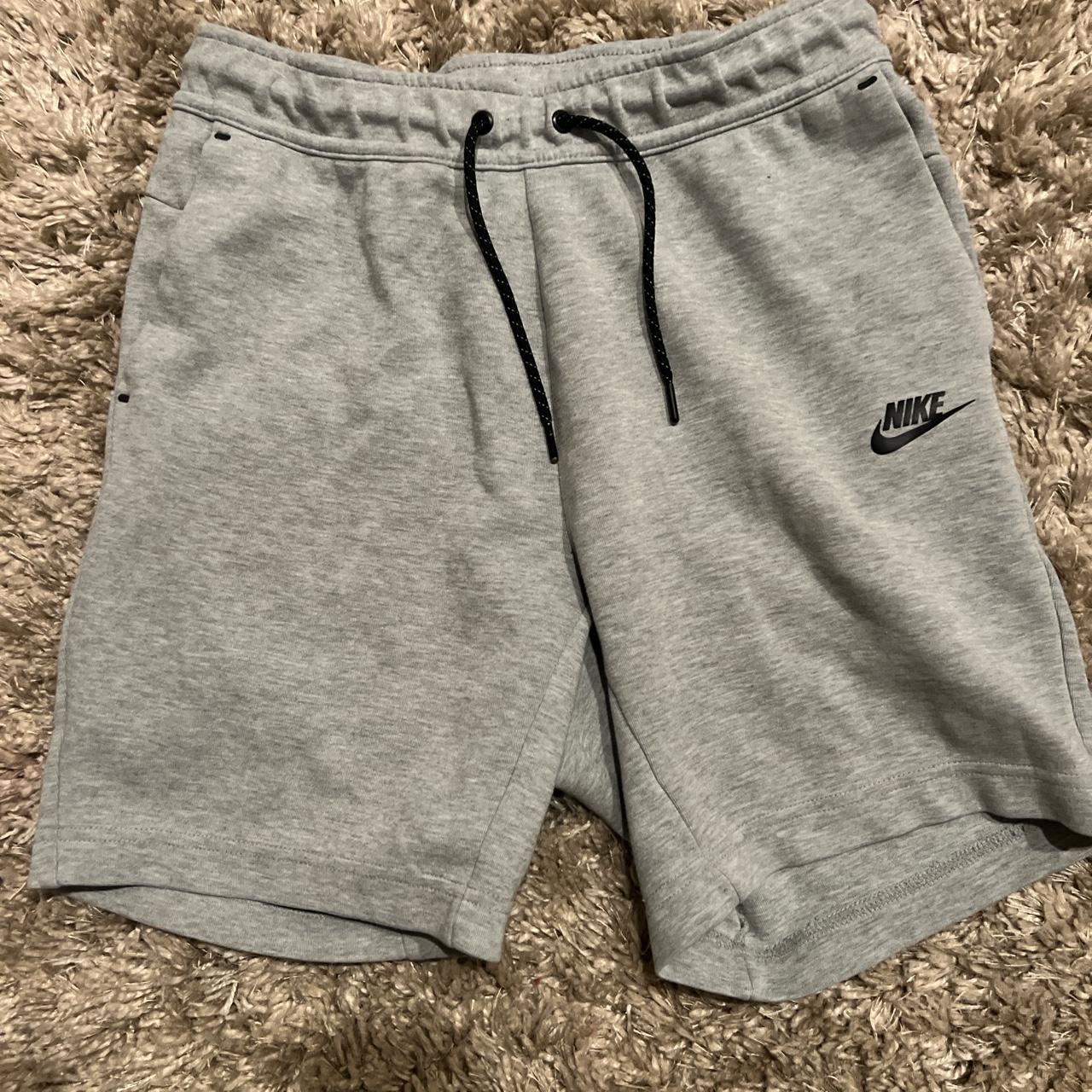 Light Grey Nike tech shorts. Comfortable feel with... - Depop