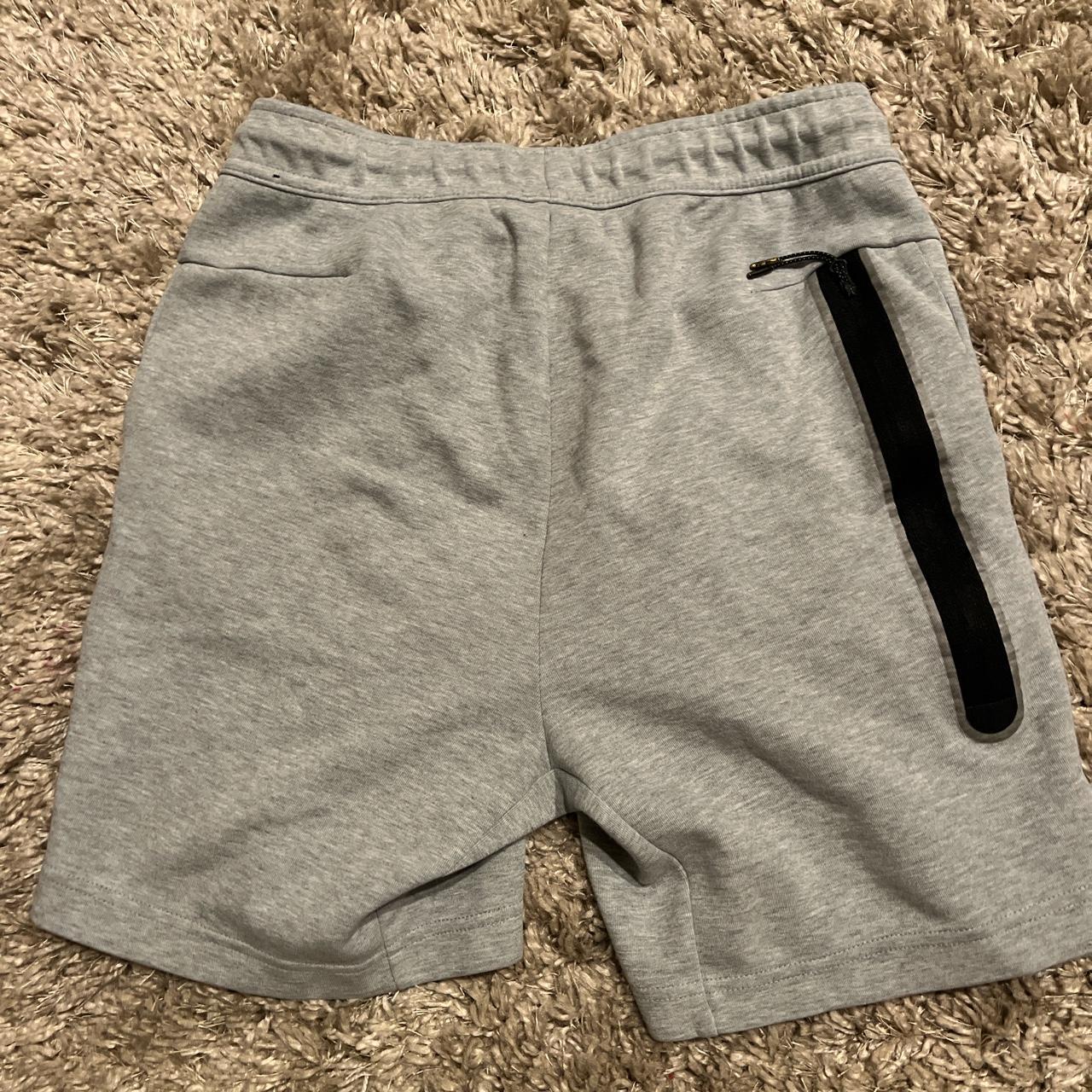 Light Grey Nike tech shorts. Comfortable feel with... - Depop