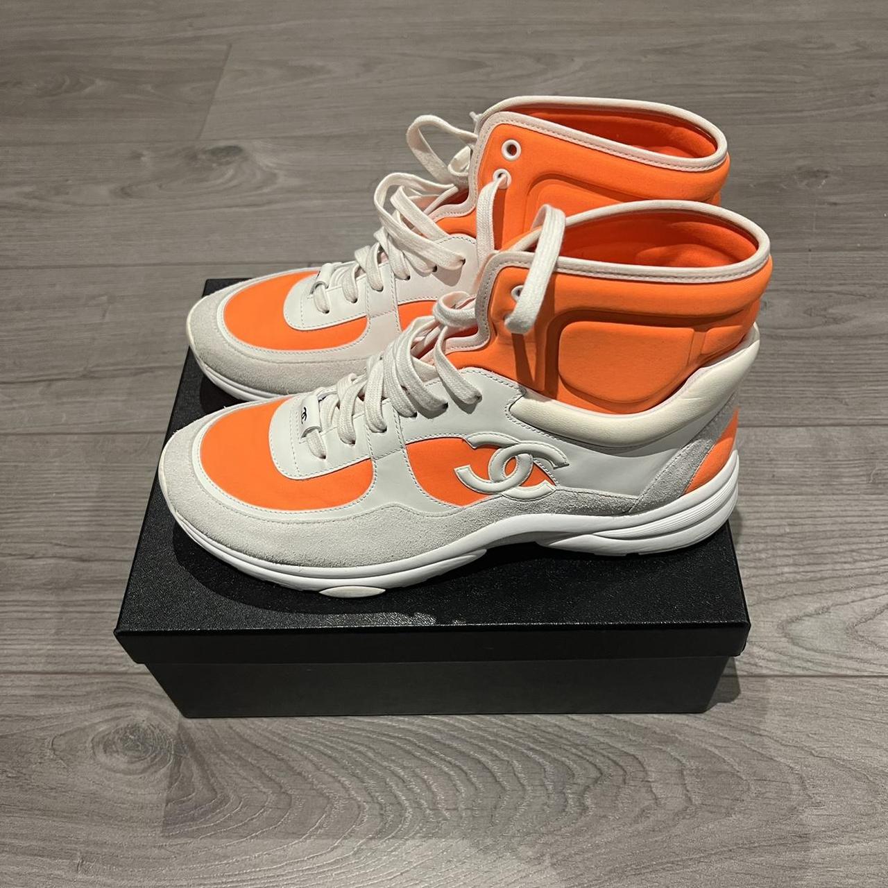 Orange chanel high top sneakers best sale