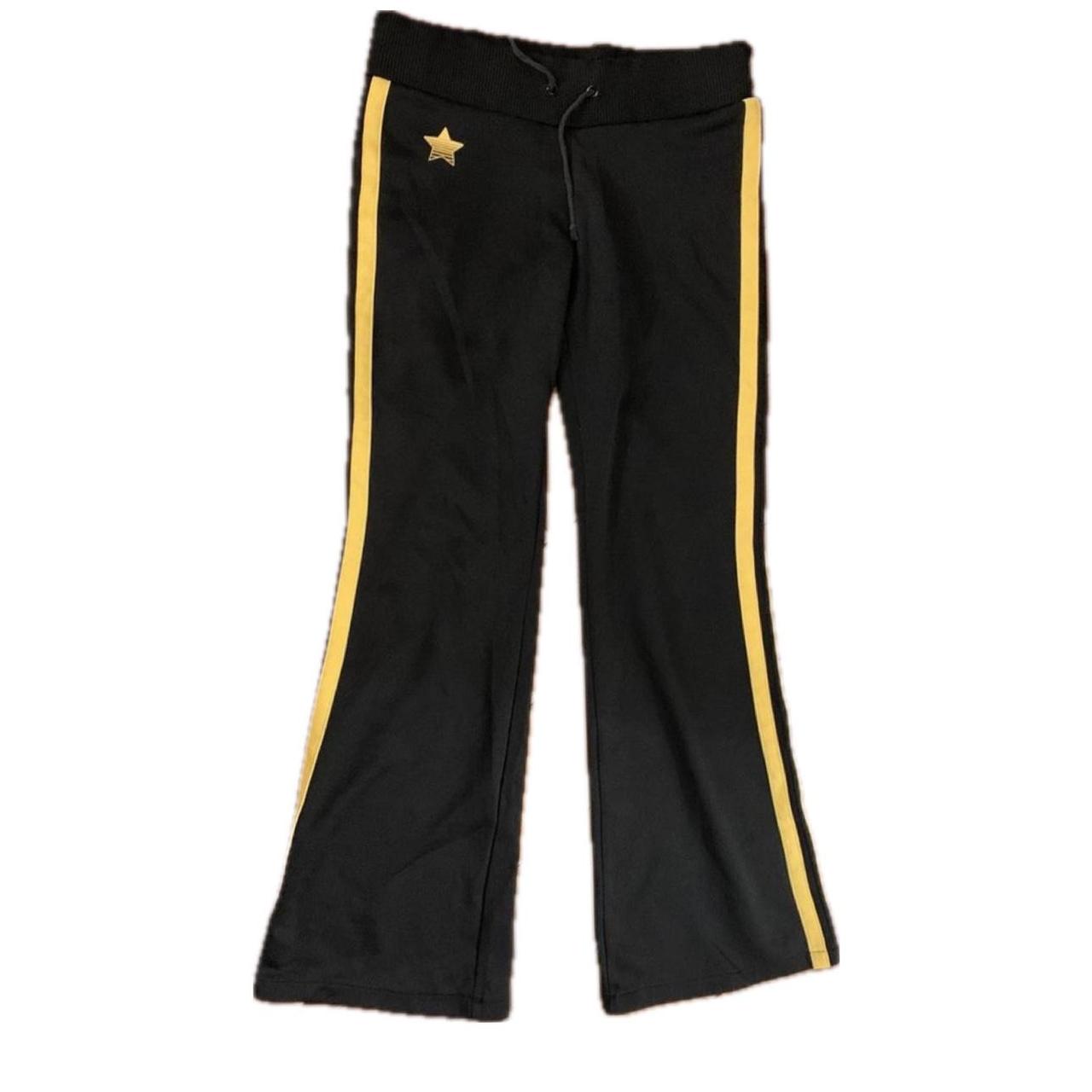 Yellow joggers 2024 black stripe