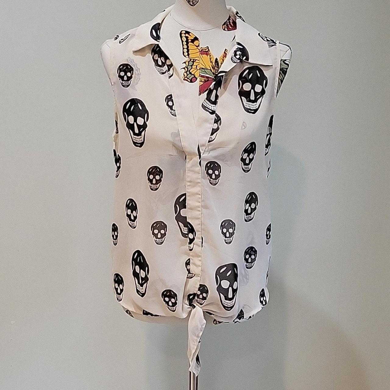 This is a silky sheer sleeveless skull shirt by. Depop