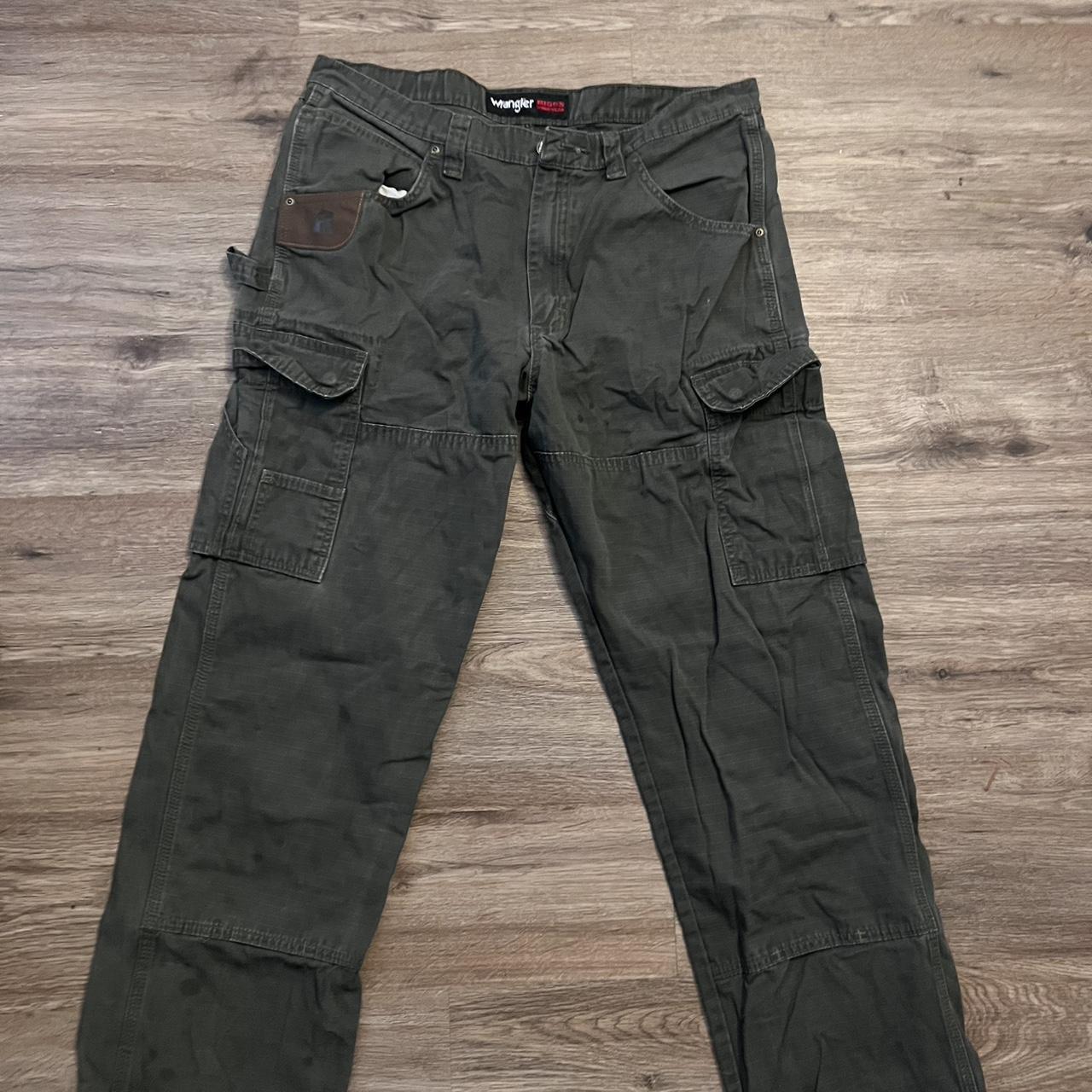 green wrangler rigs cargos a bit faded. - Depop