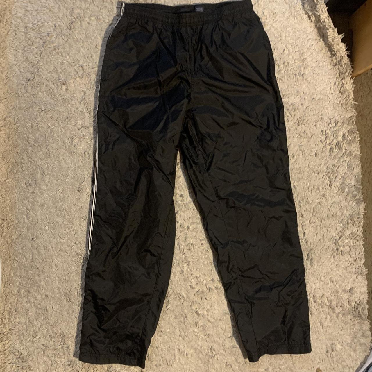 Black Gap track pants with sippers size M Dm for any... Depop