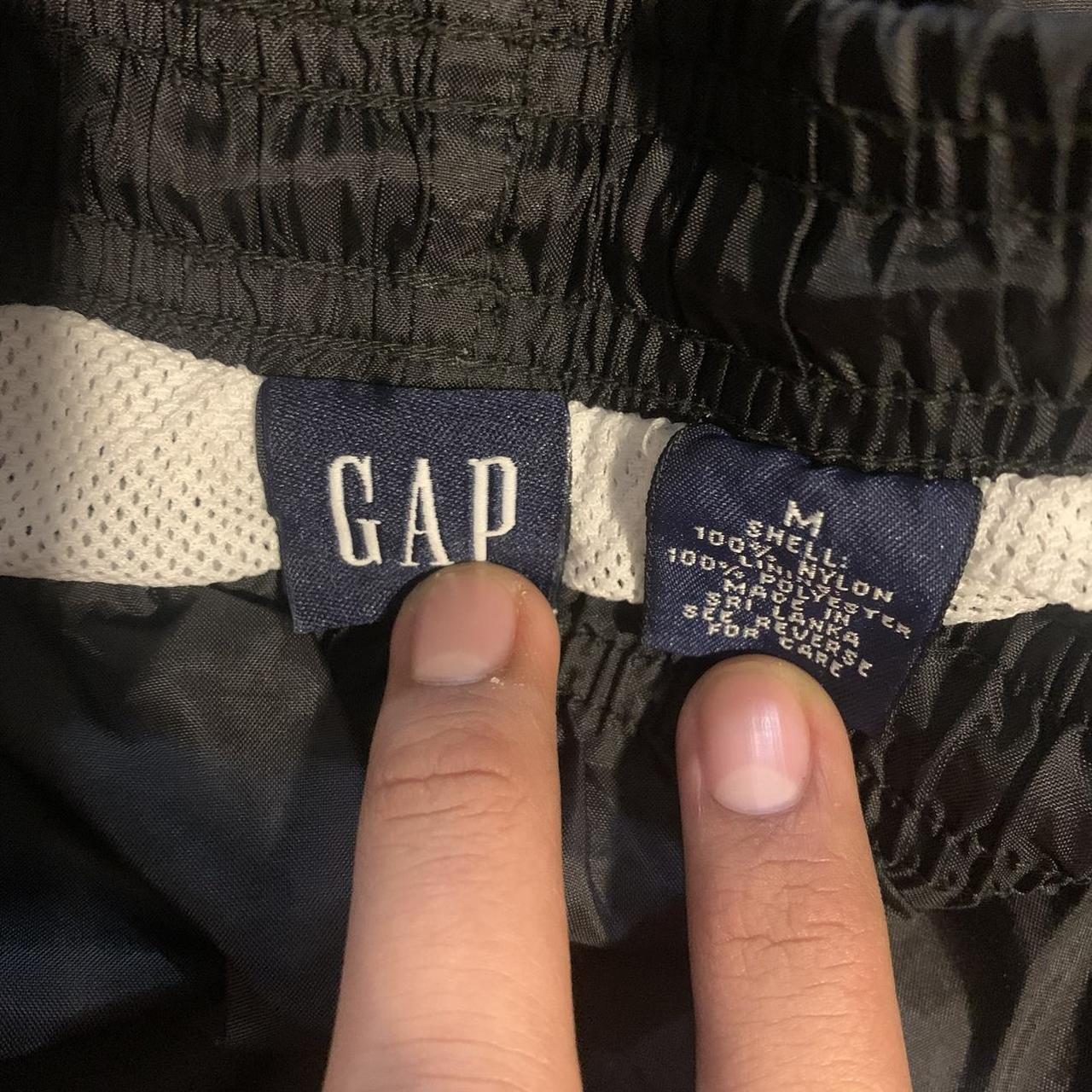 Black Gap track pants with sippers size M Dm for any... Depop