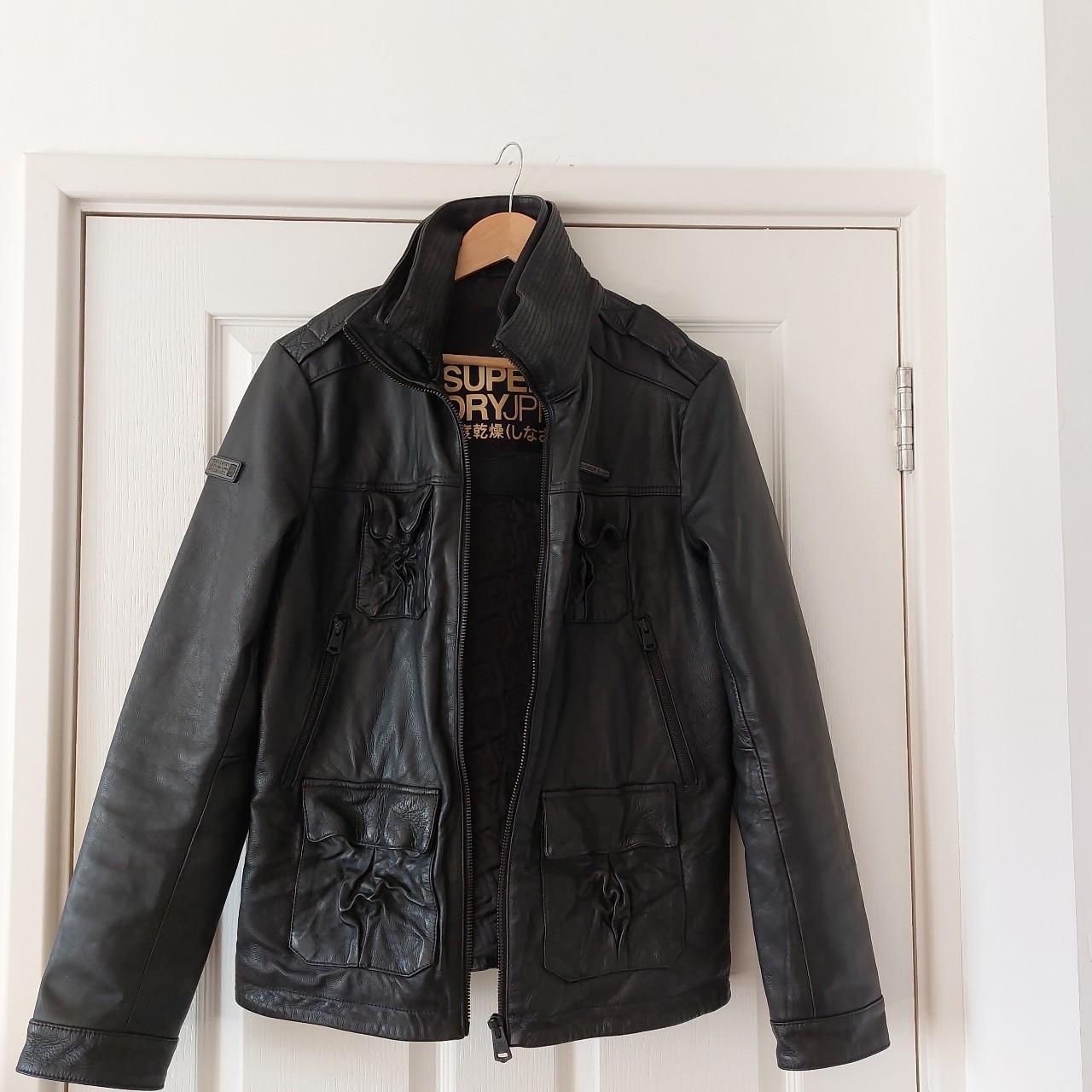 Vintage cropped leather jacket with grommet holes on... - Depop