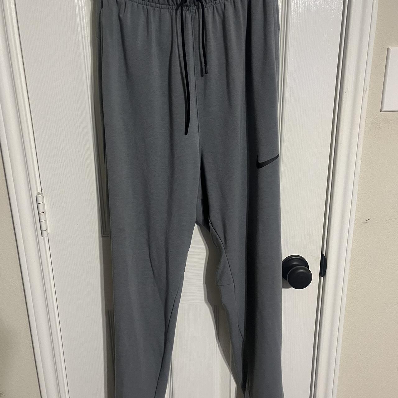 Grey Nike sweatpants in good condition with no signs... - Depop