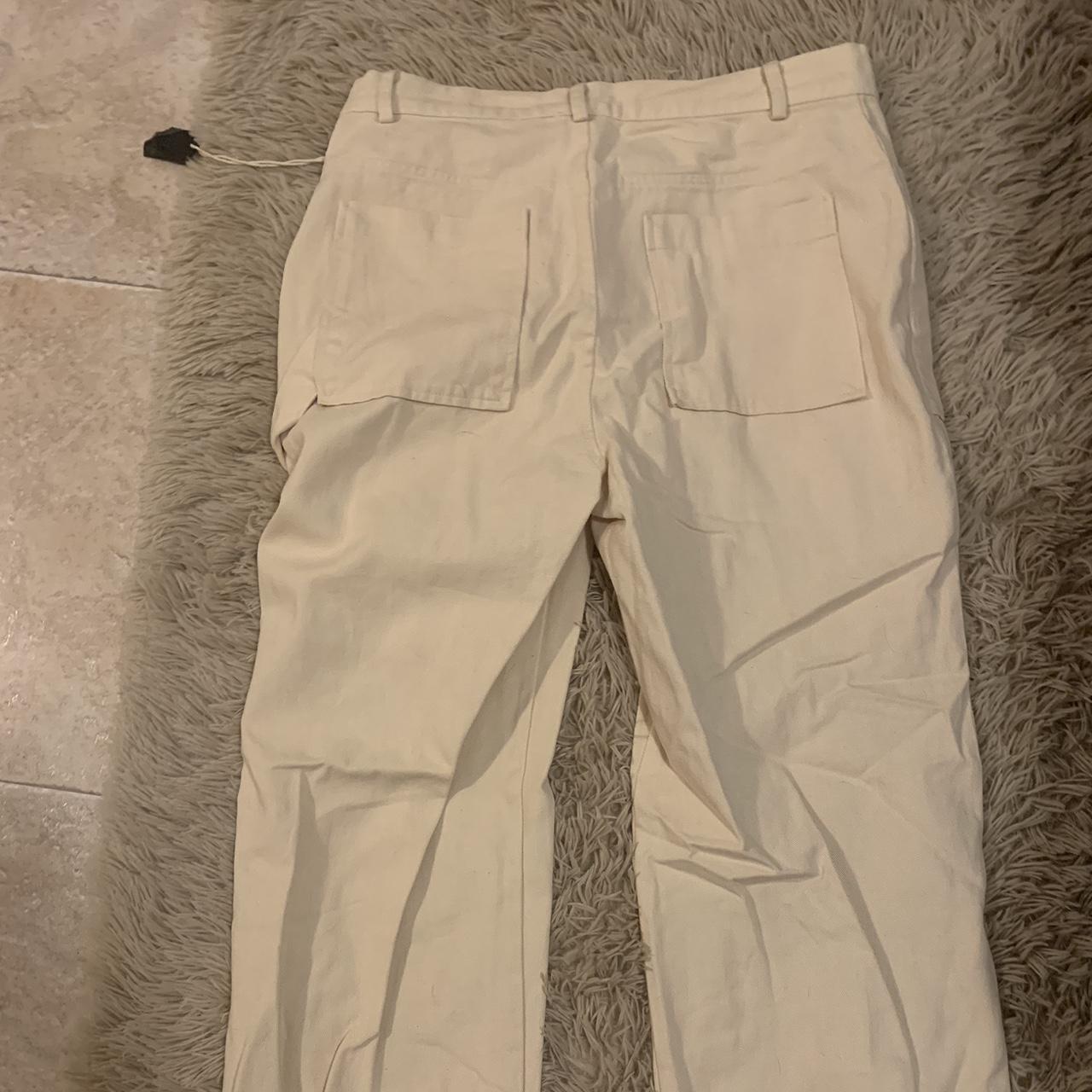 White cargo pants from Tillys that have never been... Depop