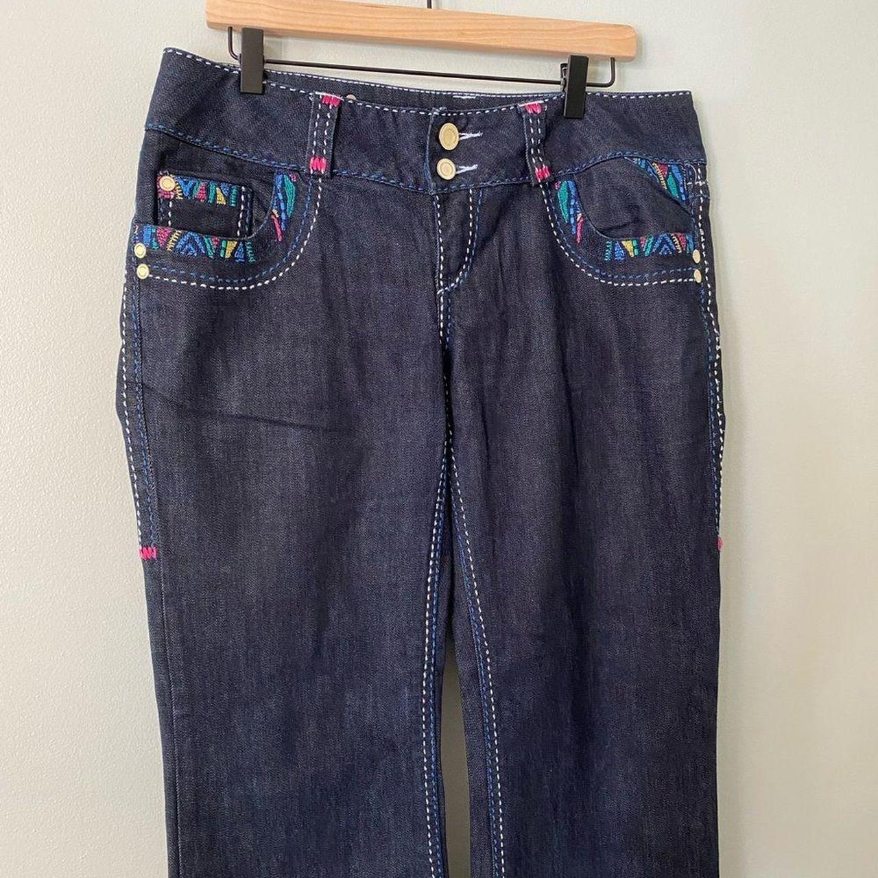 Coogi Women's Blue Jeans | Depop