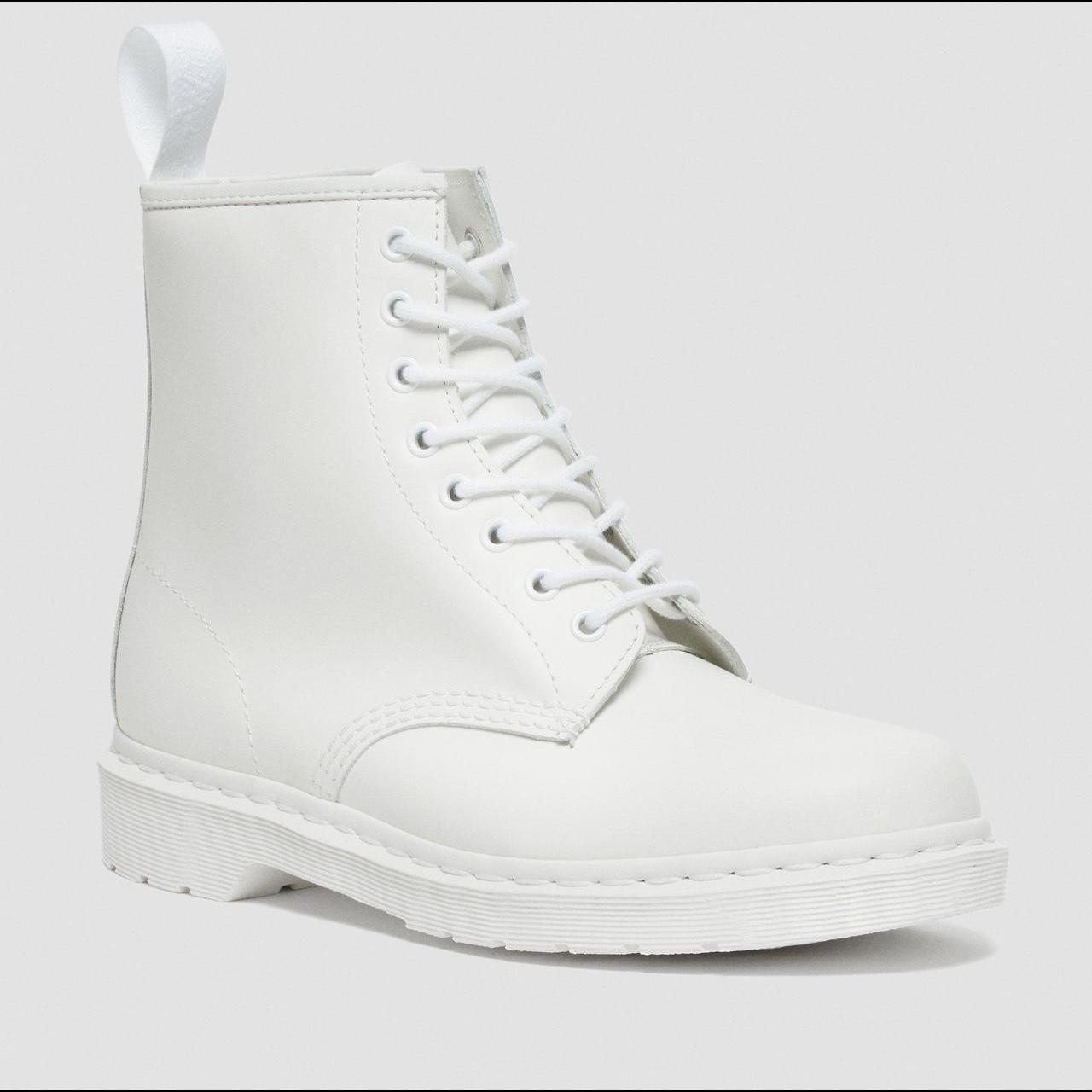 All white Doc Martens with a lot of life left Laces. Depop