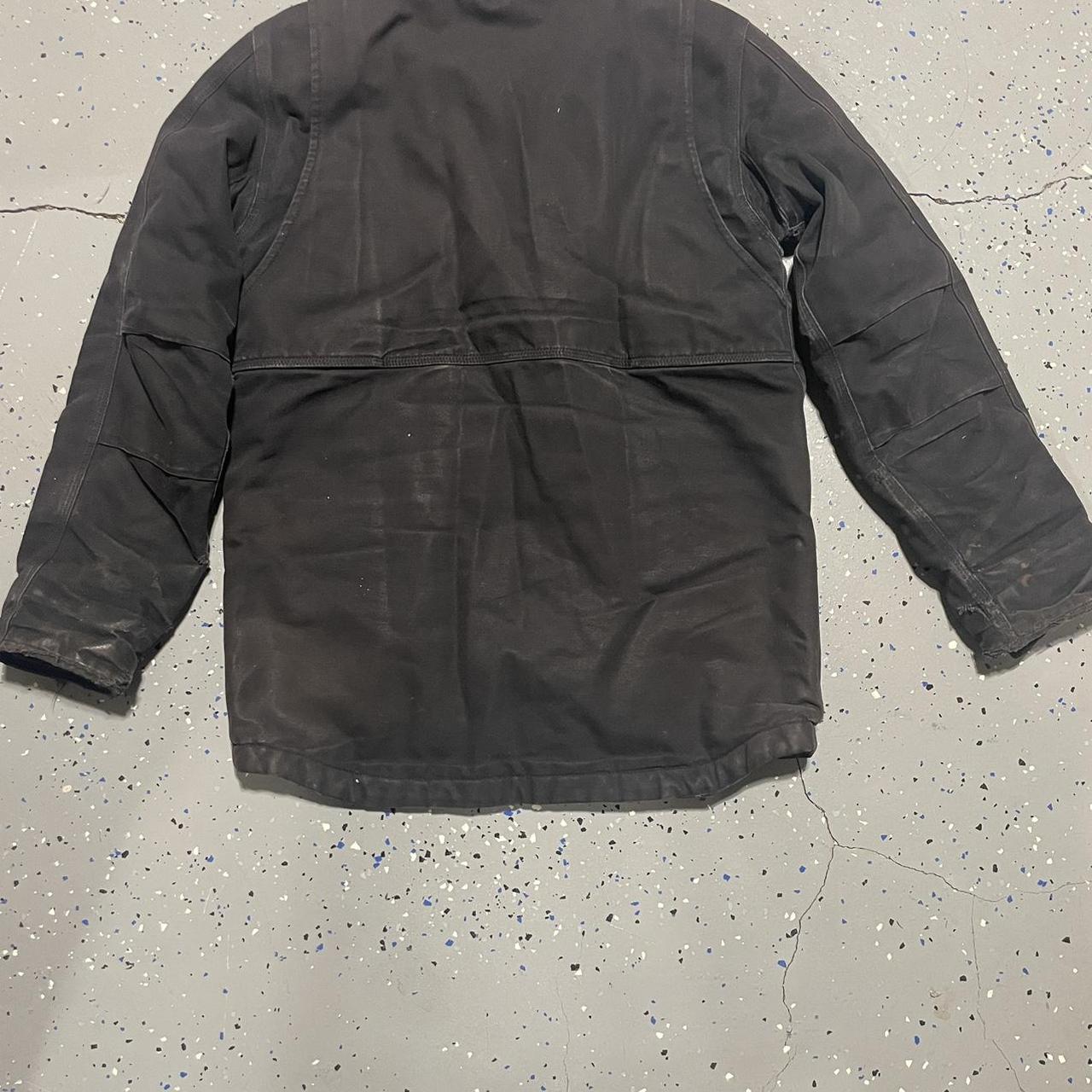 Black faded carharrt jacket Size: S but fits like... - Depop