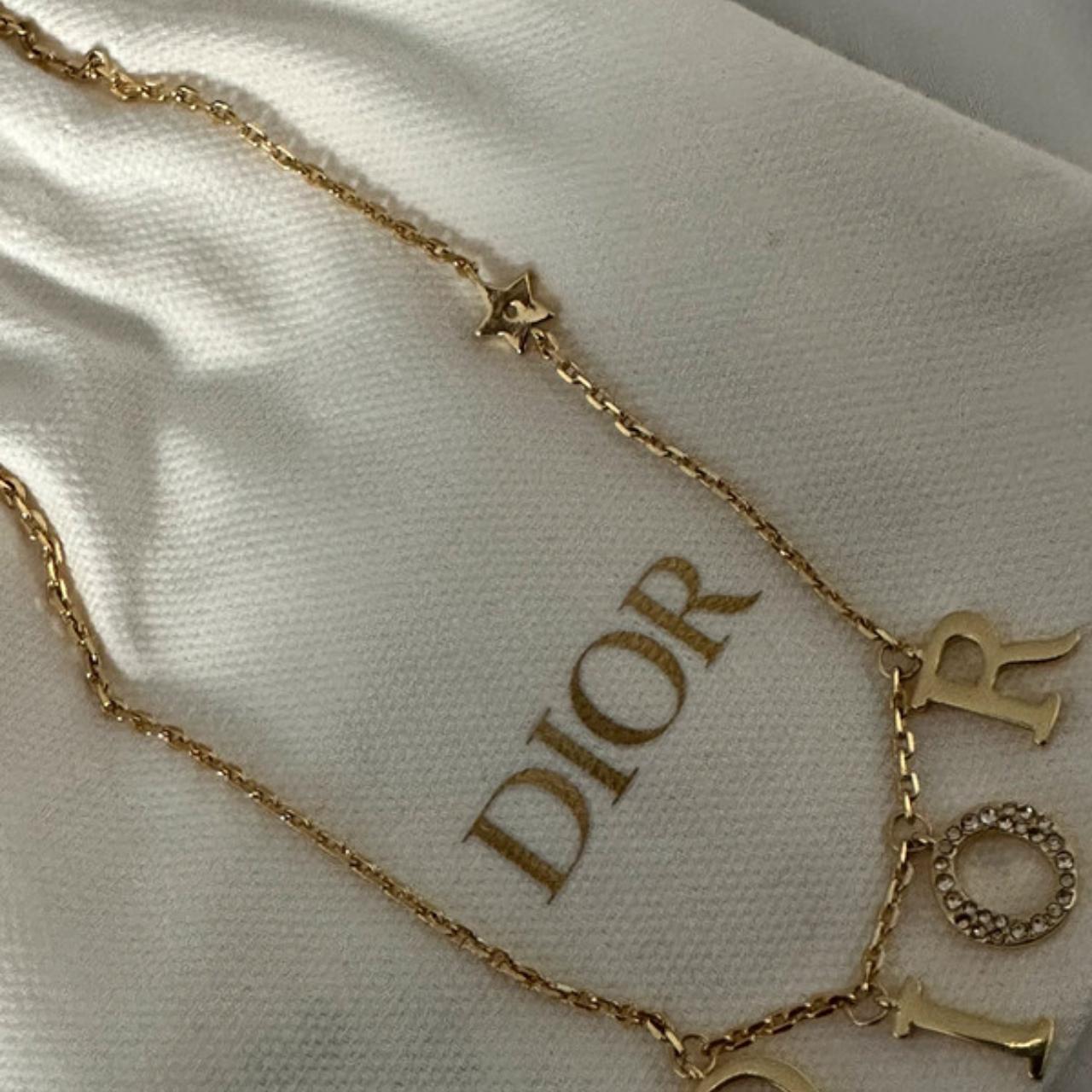 Dior Necklace Only worn once. Comes with box, ribbon... - Depop