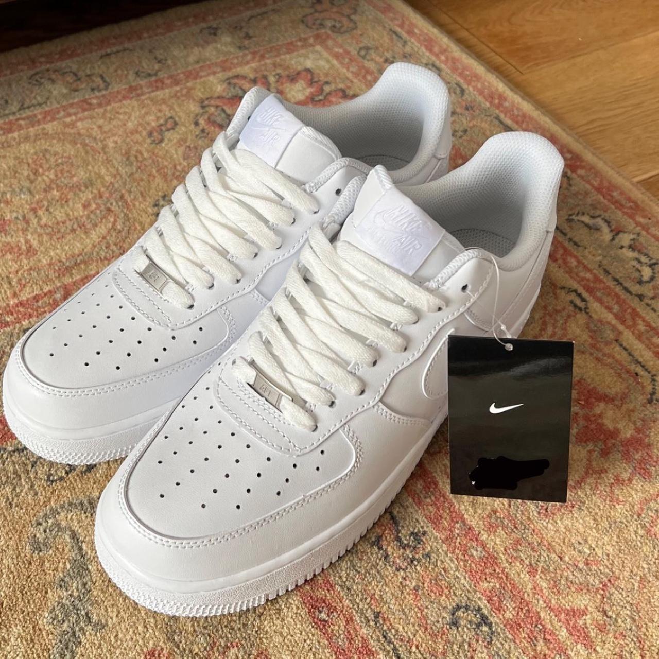 triple white nike shoes