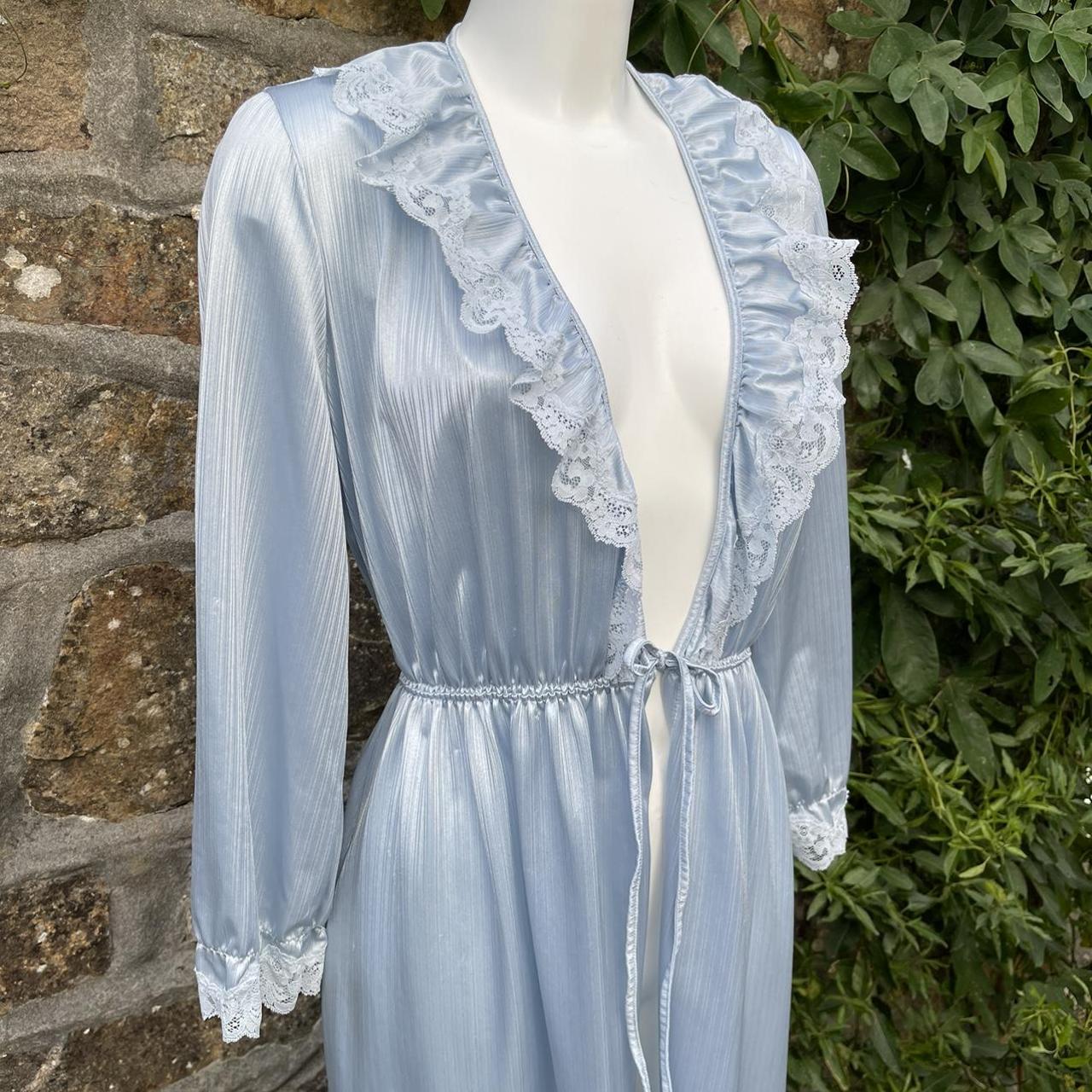 1970s shinny blue housecoat/robe with ruffle detail.... - Depop