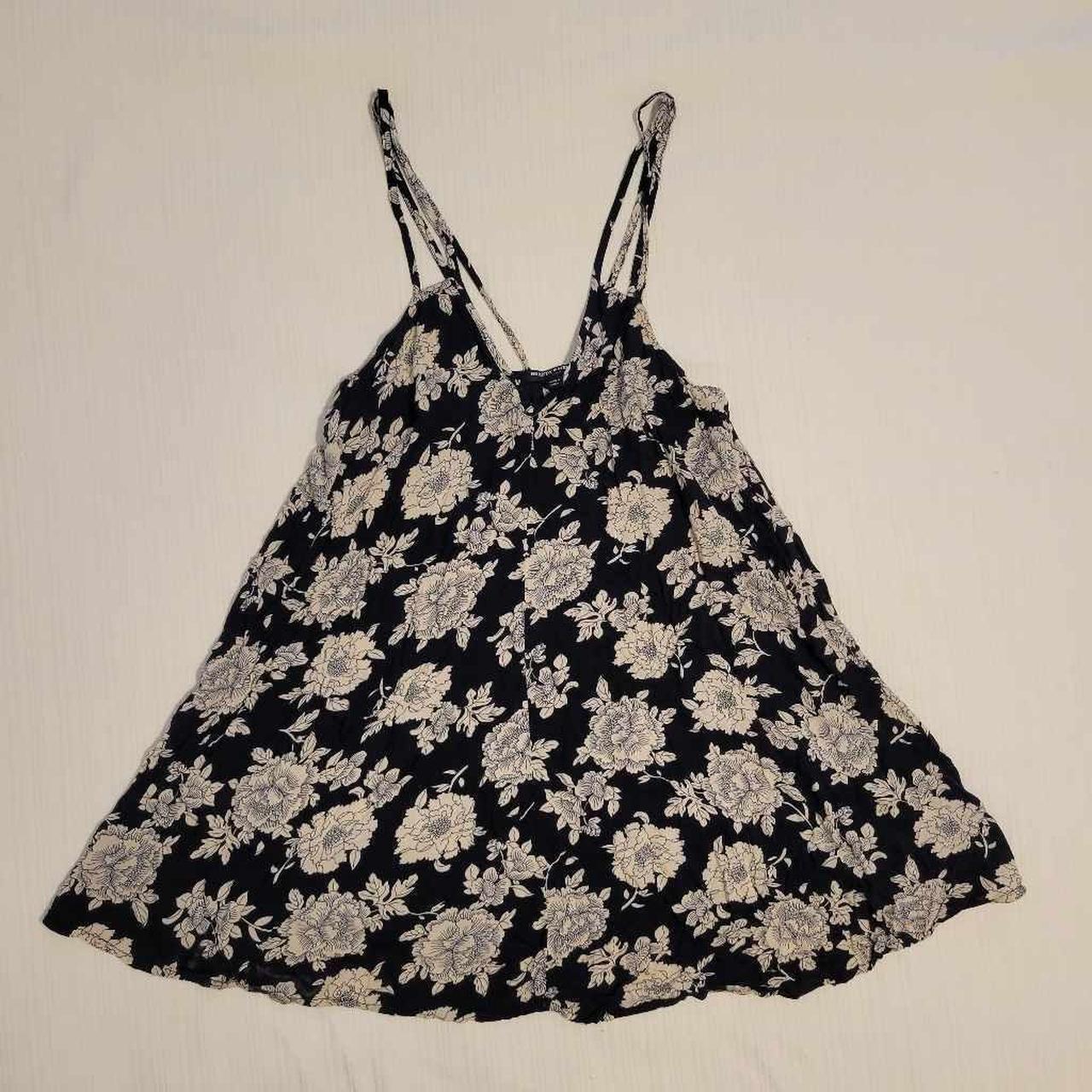 Brandy melville black and white floral strappy mini... Depop