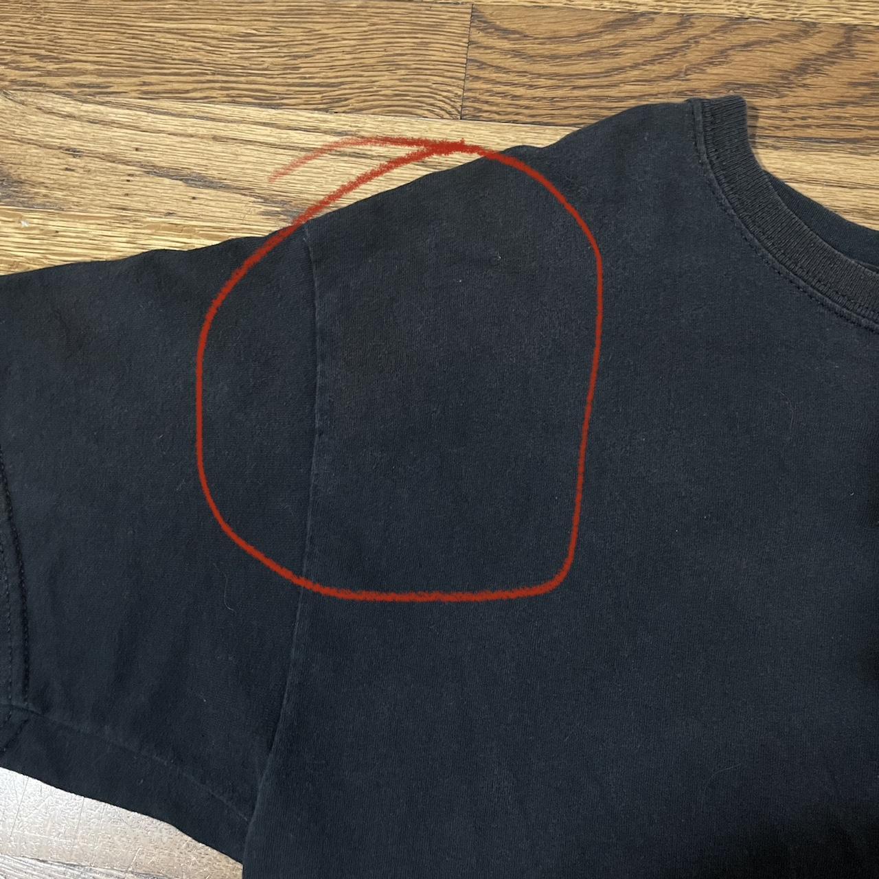 Black peanut shirt Flaws: 3 very small holes, very... - Depop
