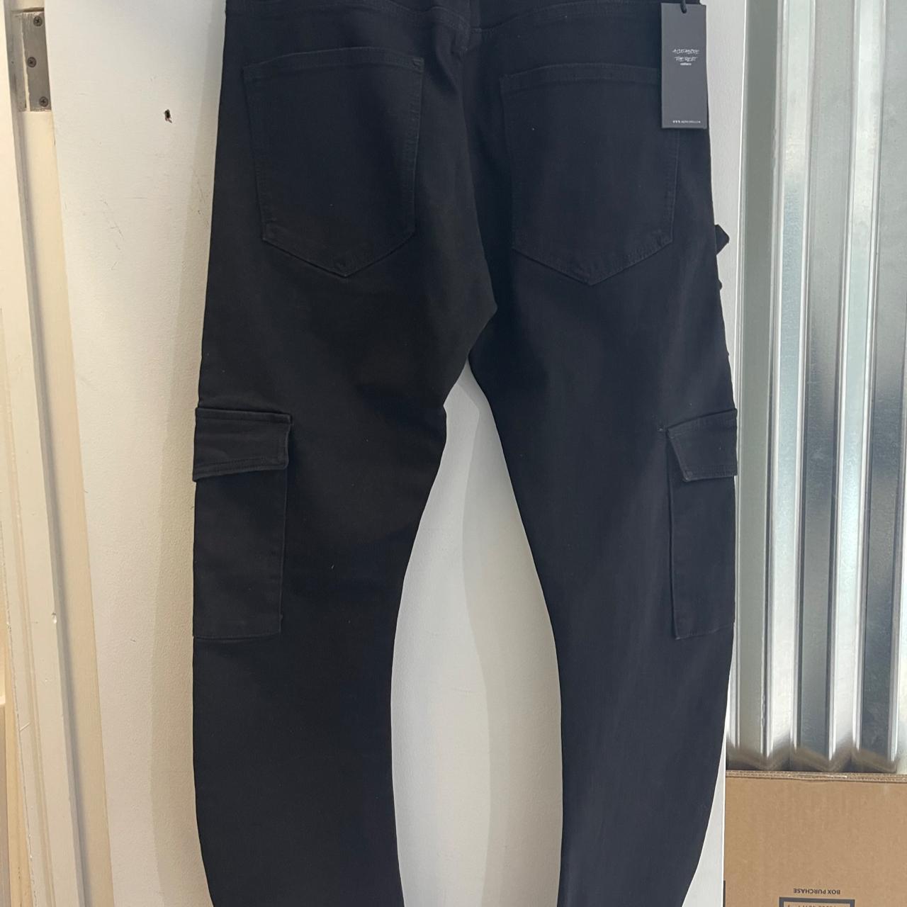 BLACK OMARI STACKED JEANS