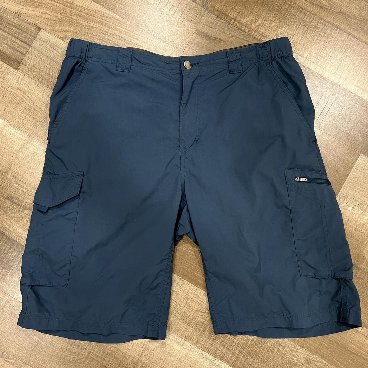 Navy blue lightweight cargo hiking shorts from... - Depop