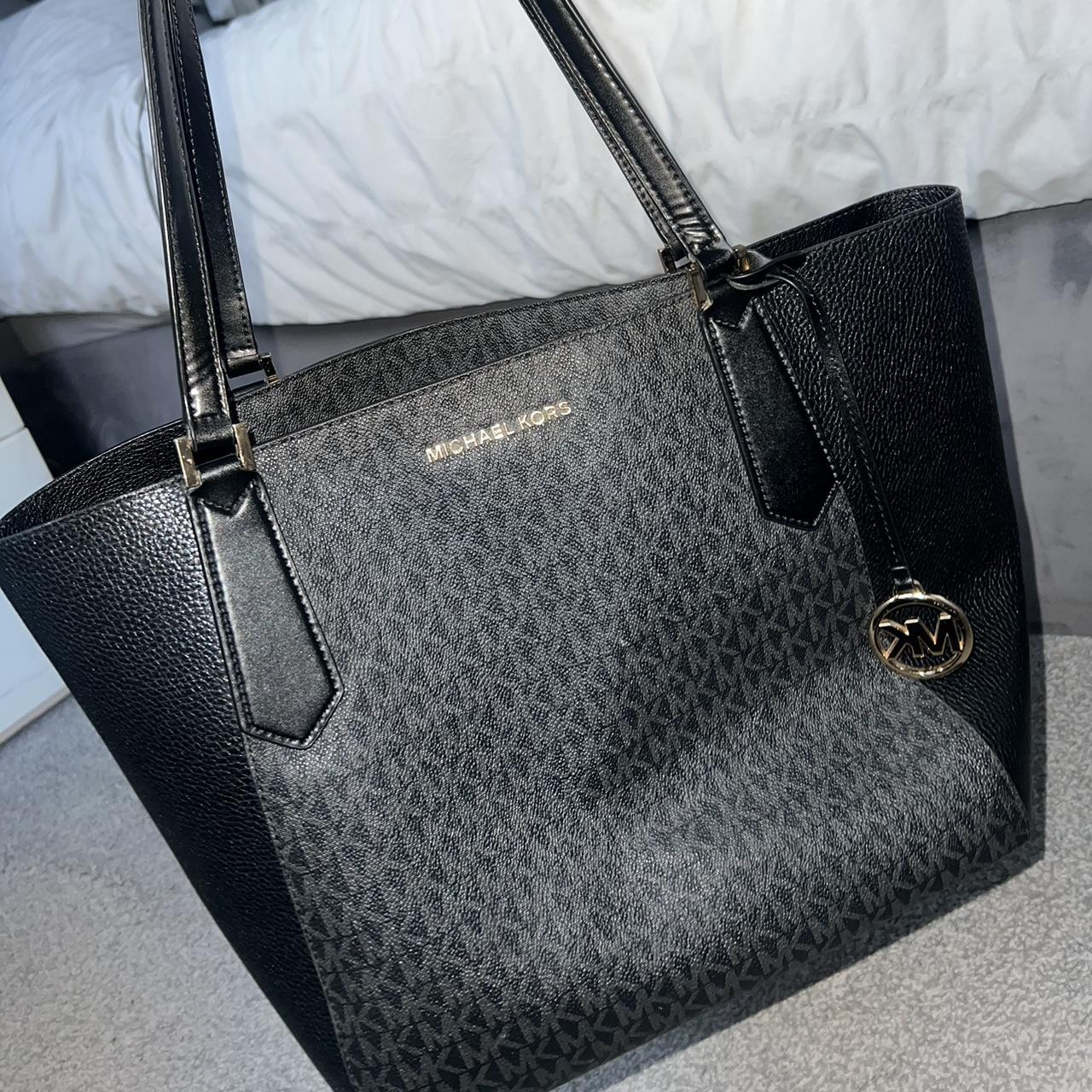 Medium sized 2024 black handbag