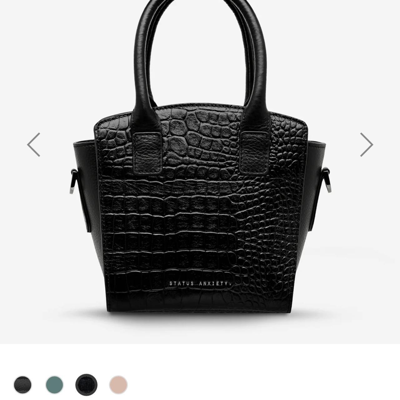 STATUS ANXIETY WORST BEHIND US handbag used... Depop