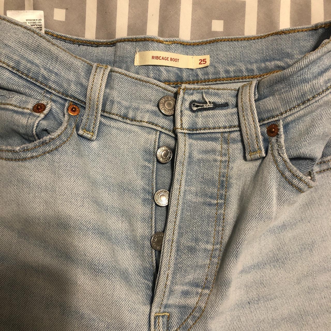 Levi’s Ribcage Boot Cut Jeans Raw hem Size... Depop