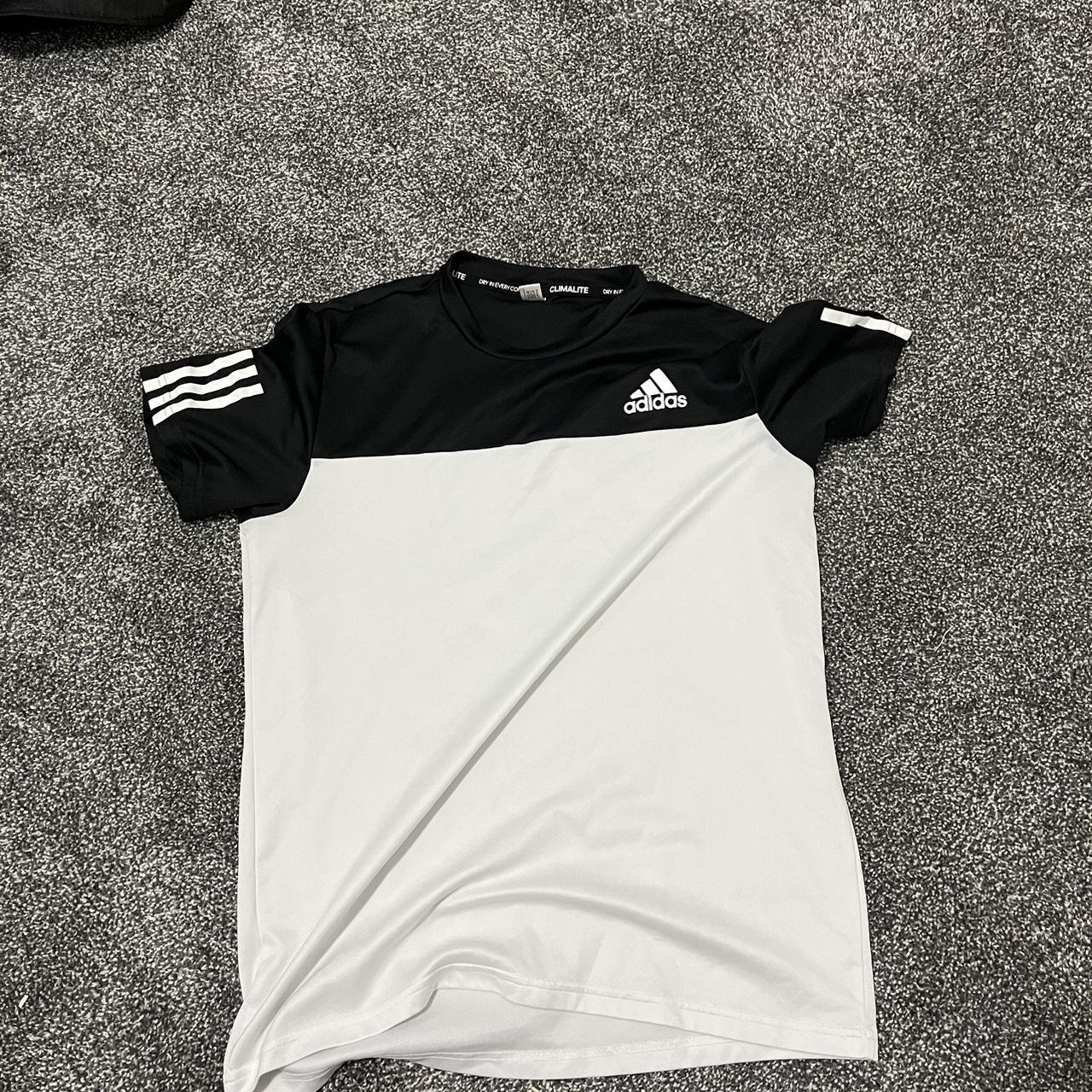 Adidas workout shirt. Condition 9/10. Fits tight for... - Depop