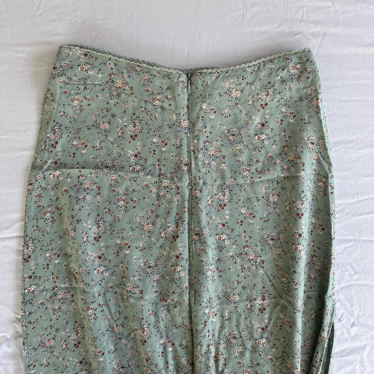 Pale mint green floral midi skirt Slit on right leg... - Depop