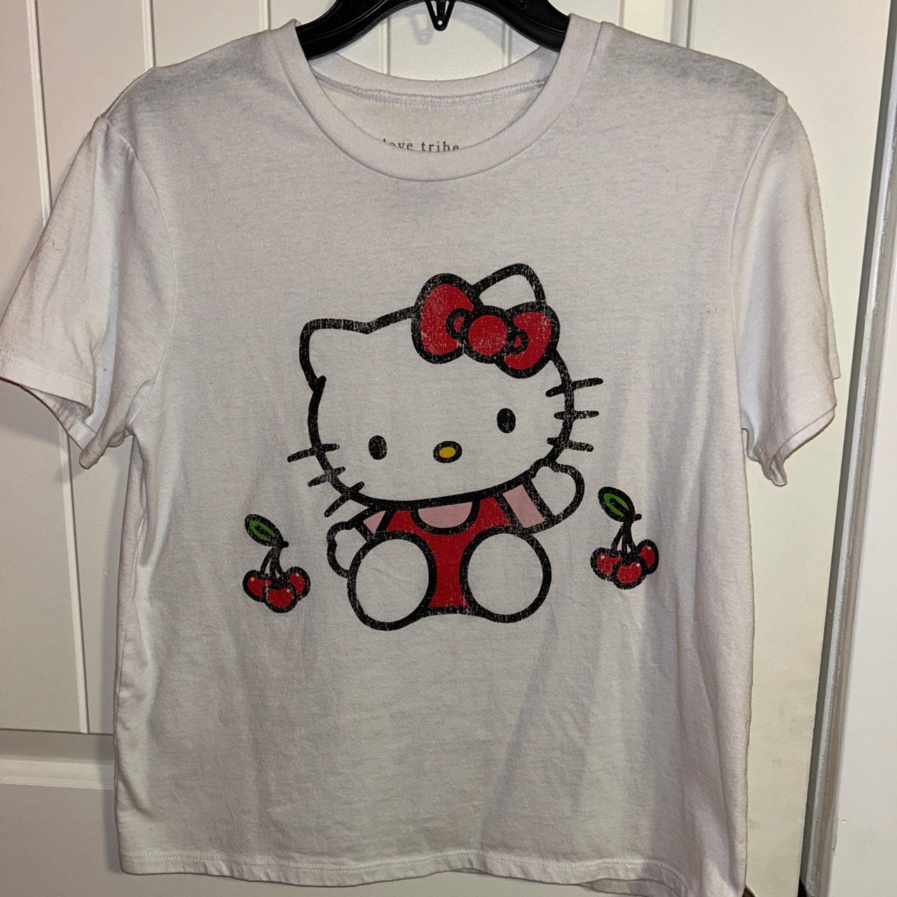 white hello kitty t shirt size M but runs a just a... - Depop