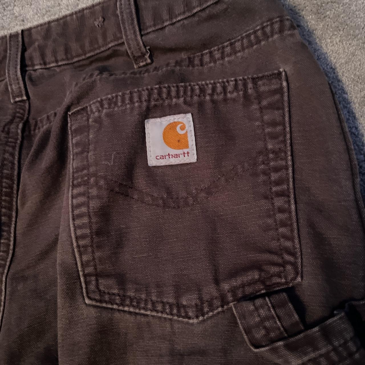 brown carhartt tag ripped off I would guess like... - Depop