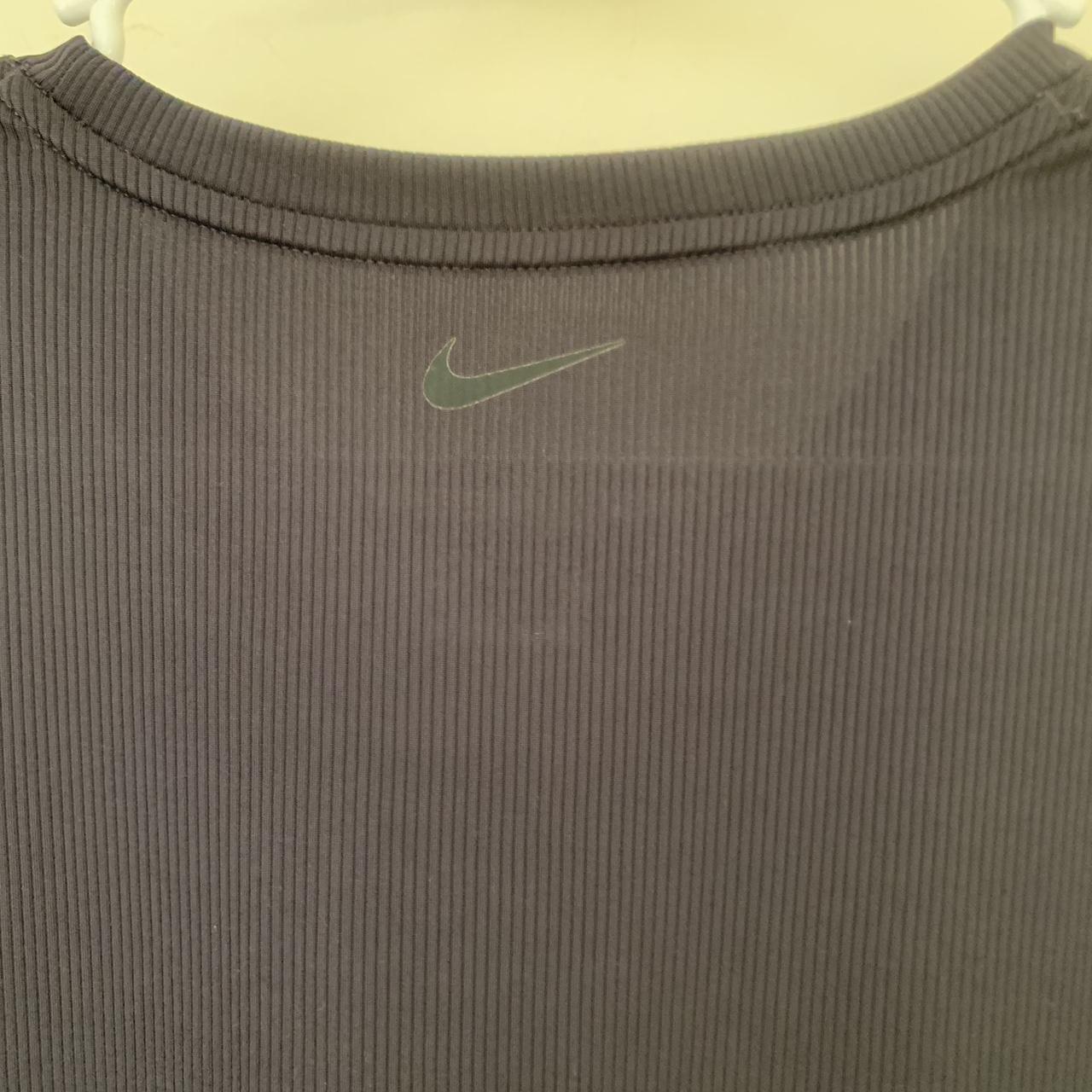 Nike cover up or yoga tee. Batwing sleeve, size S.