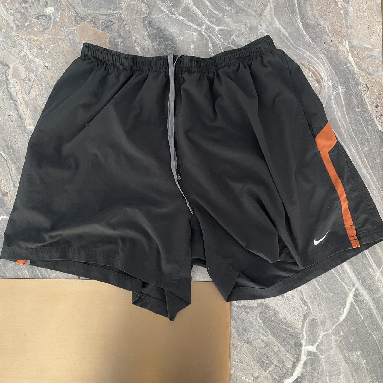 Orange and black 2025 nike shorts