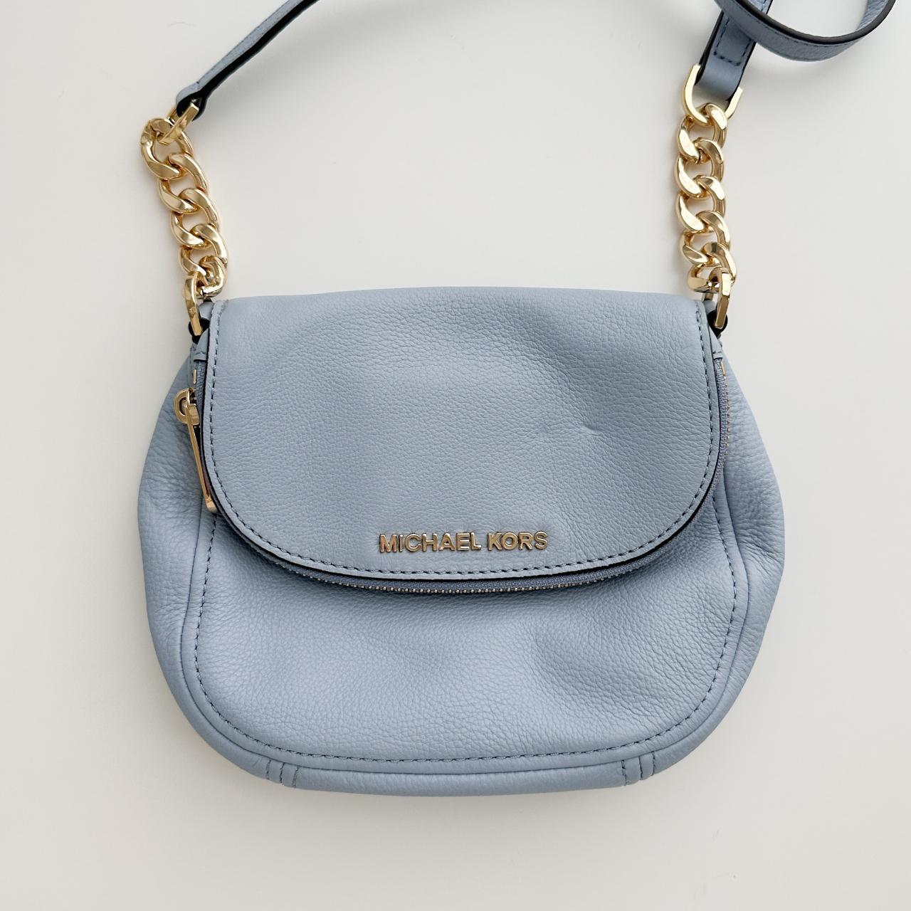 Michael Kors Light Blue Crossbody Bag has one tiny. Depop