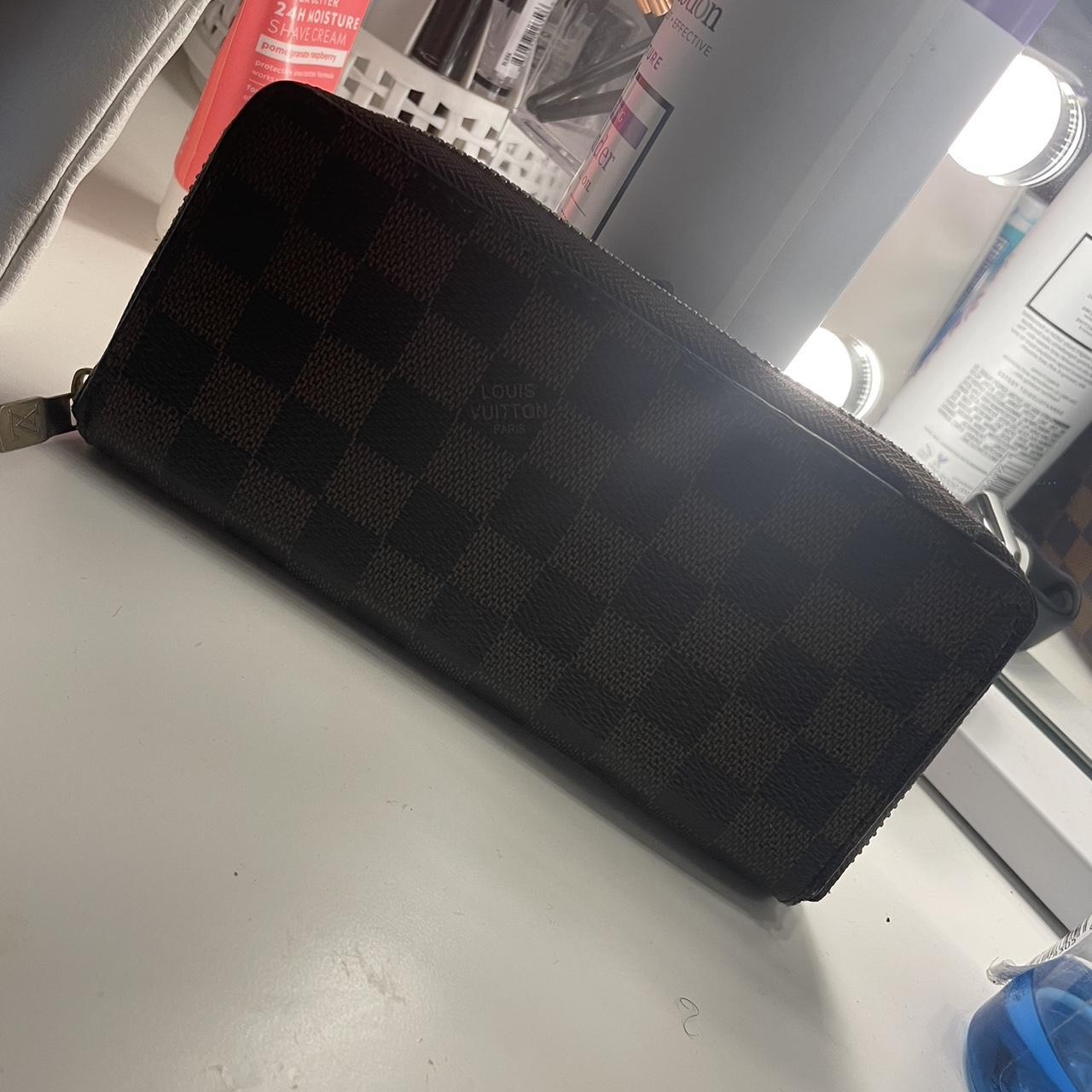 Real LV wallet Send offers!! It looks scratches - Depop