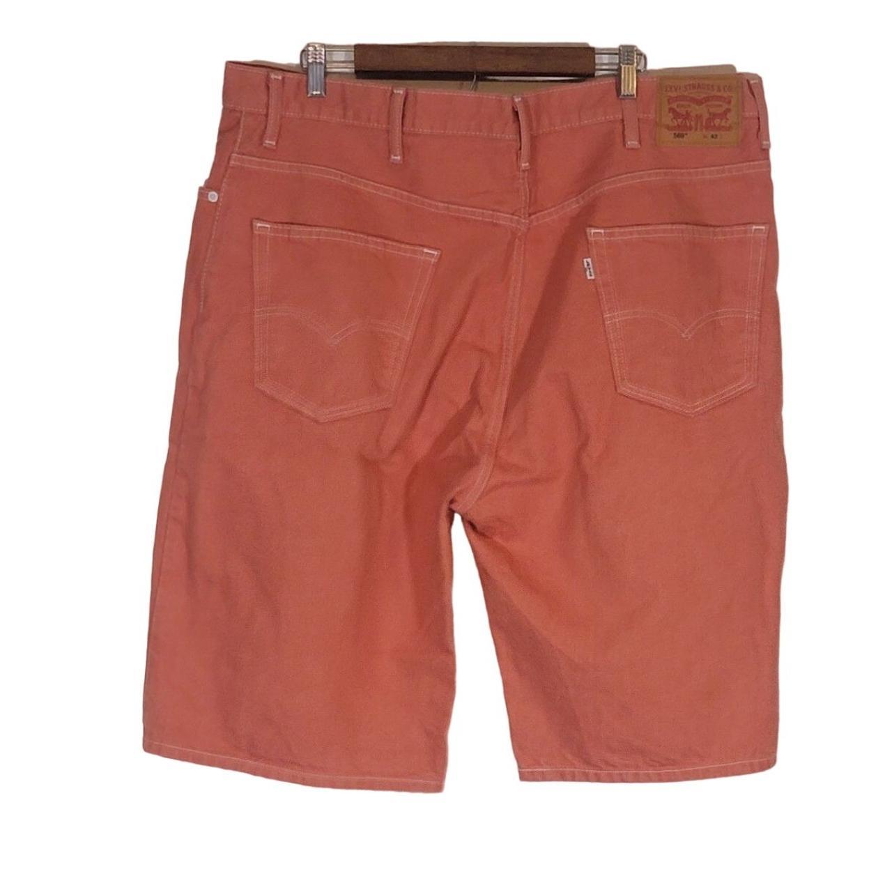 These Levias Rust Color shorts are in Excellent... - Depop